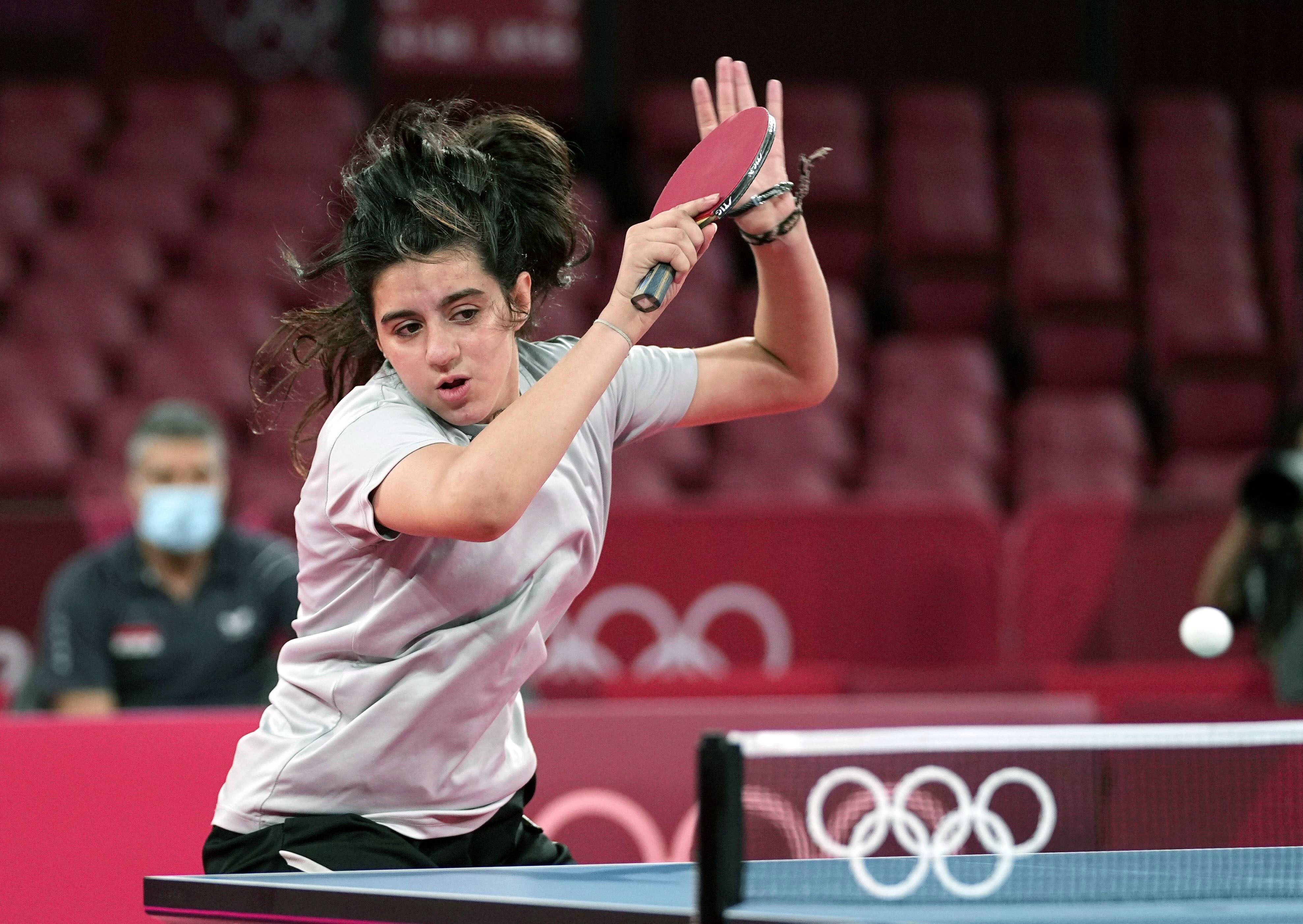 Hend Zaza, the youngest athlete competing in the Tokyo Olympics, in action during the opening round of the women’s table tennis singles on July 24. Photo: Kyodo