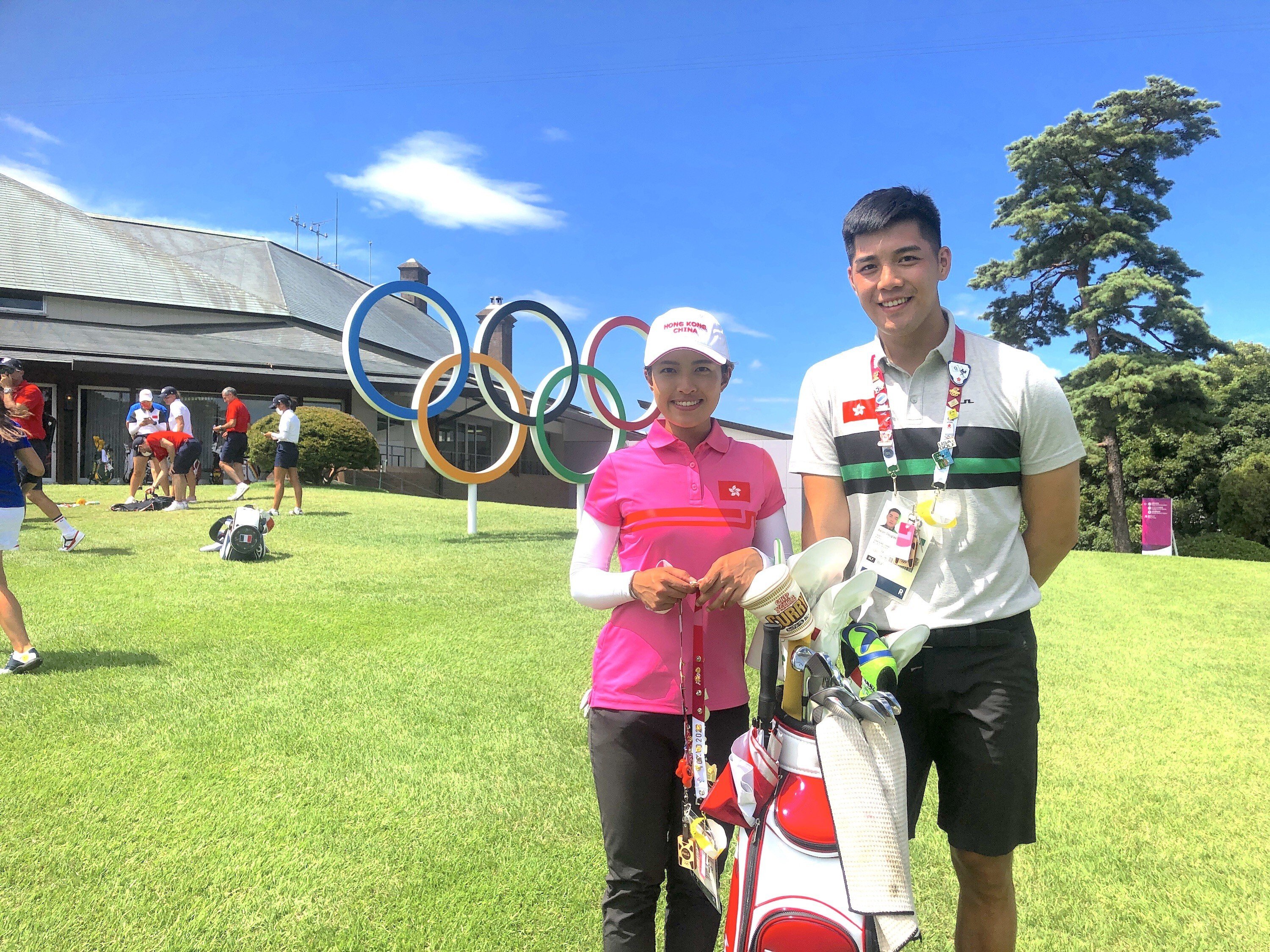 Hong Kong golfer Tiffany Chan Tsz-ching and caddie Aaron Chu at the Kasumigaseki Country Club in Tokyo, where she will open her Olympic Games campaign on Wednesday. Photo: IGF