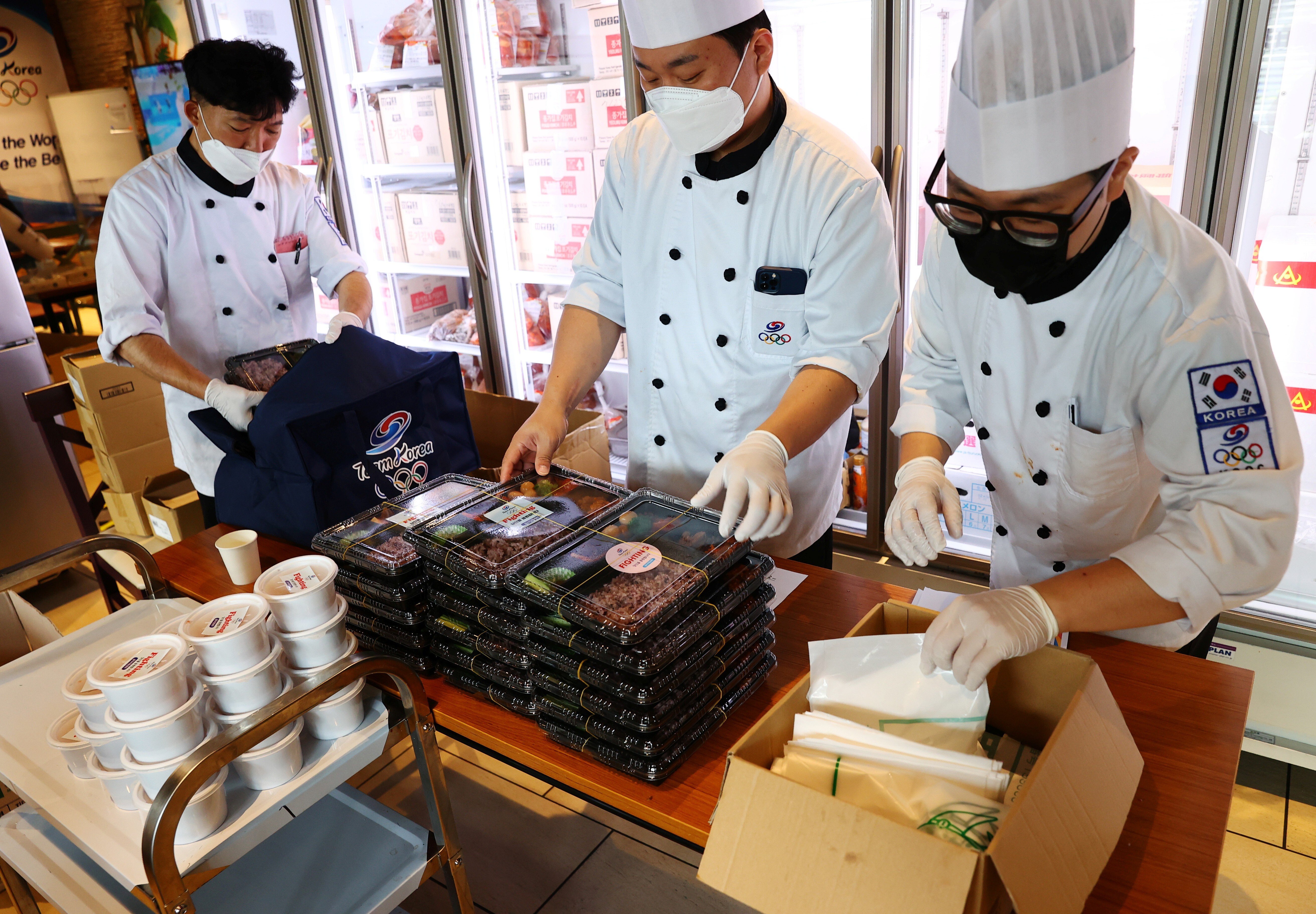 Chefs dispatched from South Korea prepare boxed meals for the country‘s Tokyo 2020 Olympic Games delegation at a hotel in Japan rented out for their sole use. Photo: Reuters
