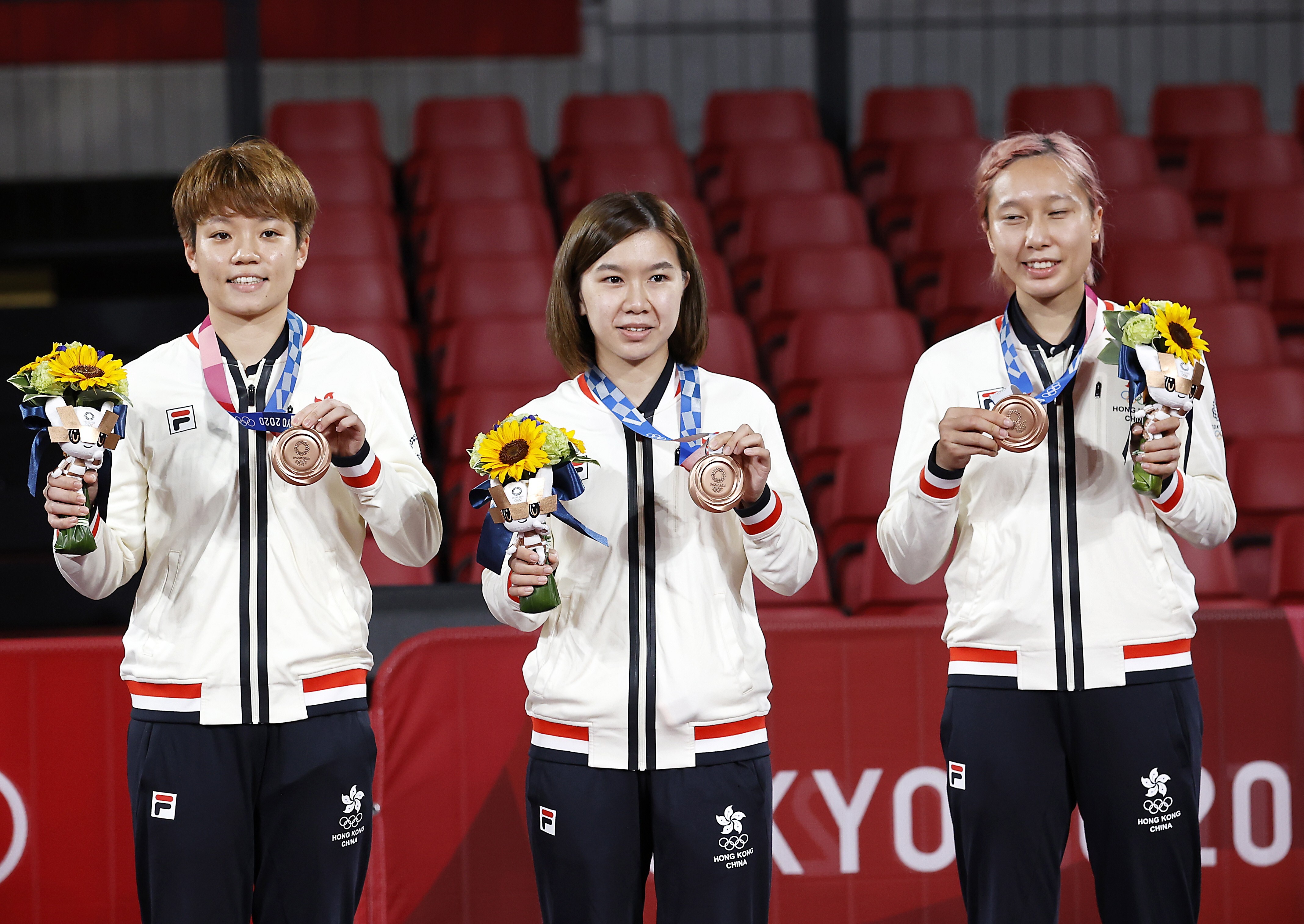 Bronze medallists Doo Hoi-kem (from left), Lee Ho-ching and Minnie Soo brought home Hong Kong’s fourth medal of the Tokyo Olympics. Photo: EPA-EFE