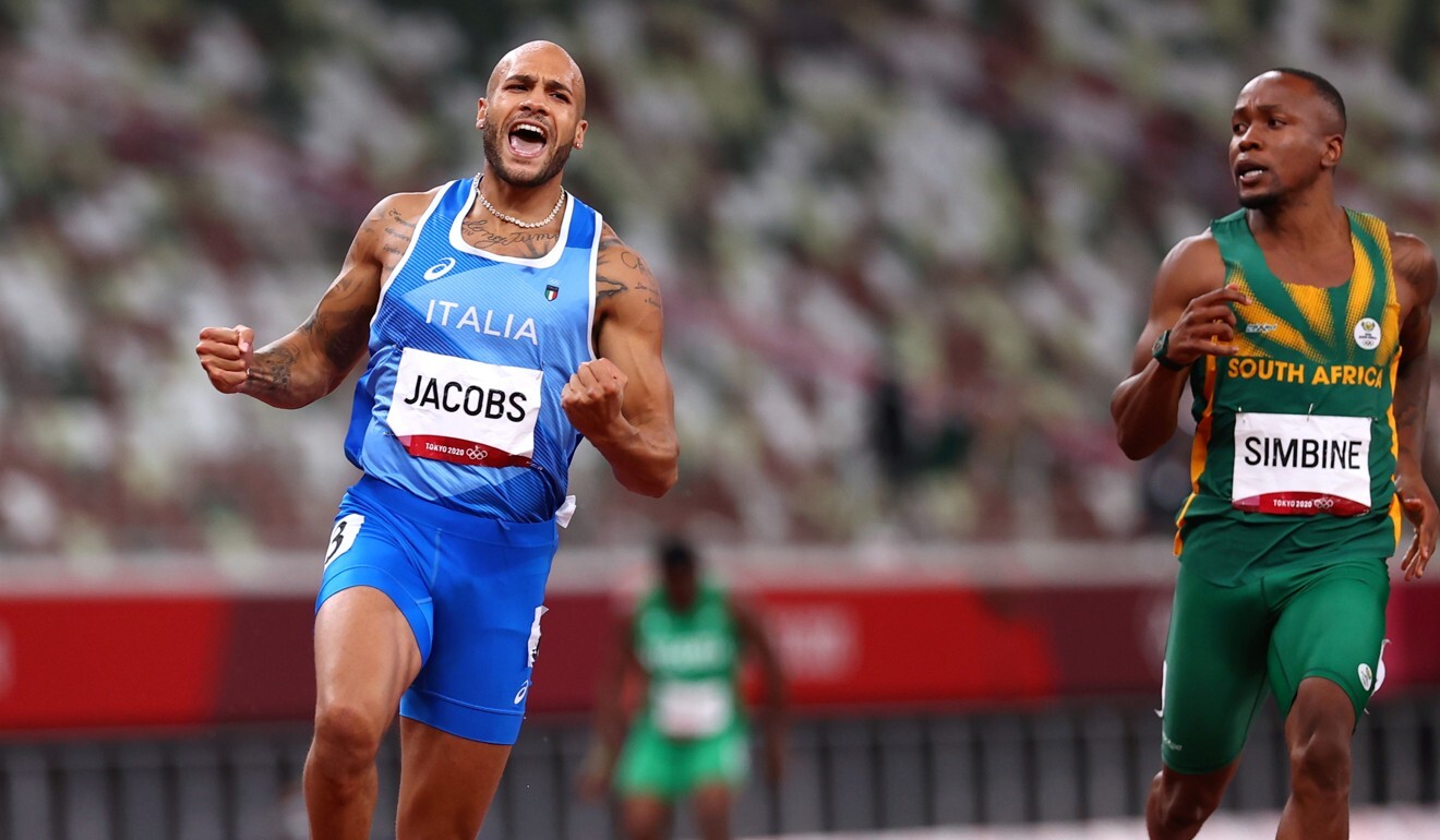 Italian Lamont Marcell Jacobs crosses the final line first to win the Tokyo Olympics men’s 100m final. Photo: Reuters