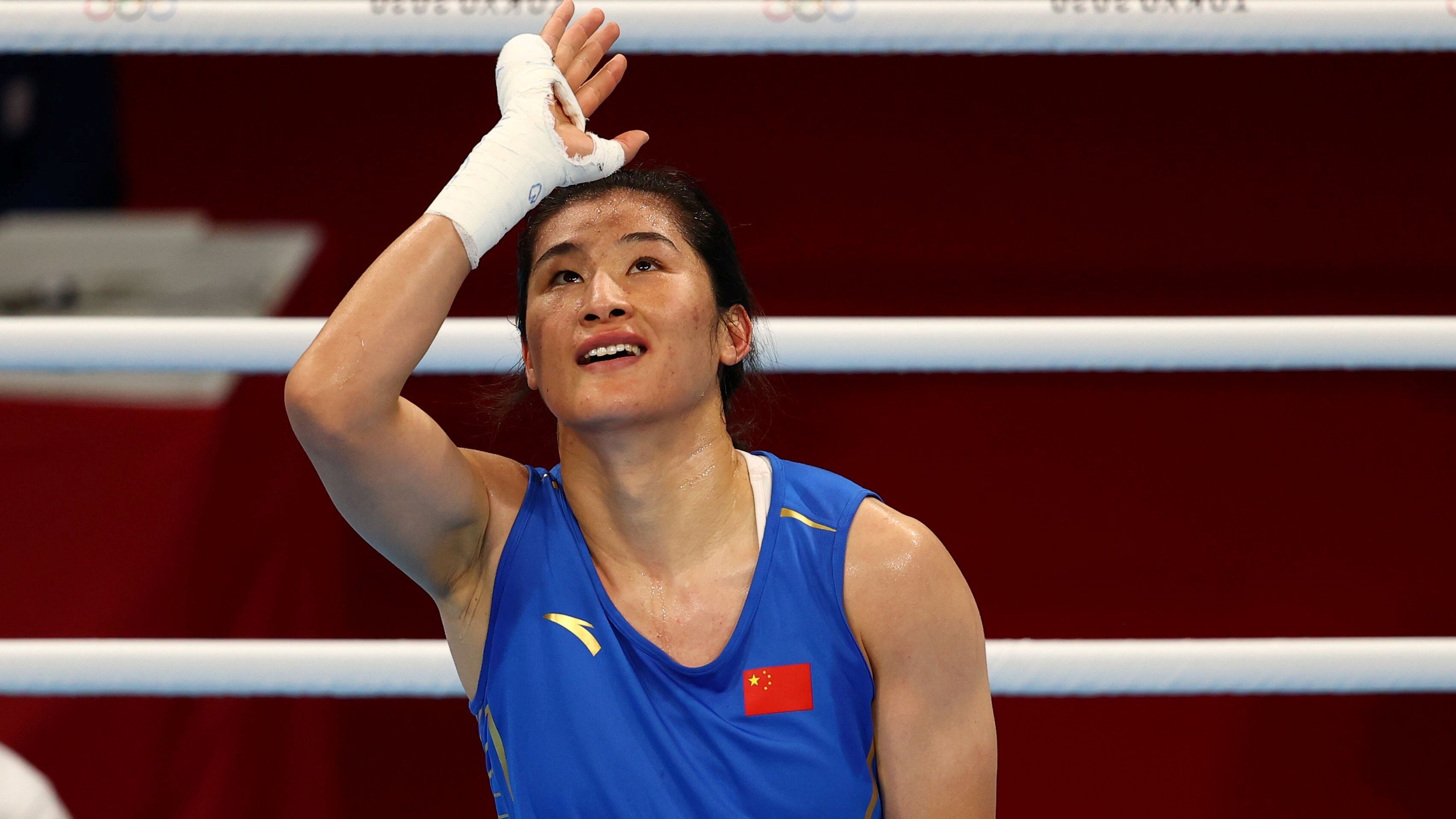 Li Qian of China celebrates her win against Zenfira Magomedalieva of the Russian Olympic Committee in the Tokyo 2020 Olympic Games boxing women’s middleweight semi-final. Photo: Reuters