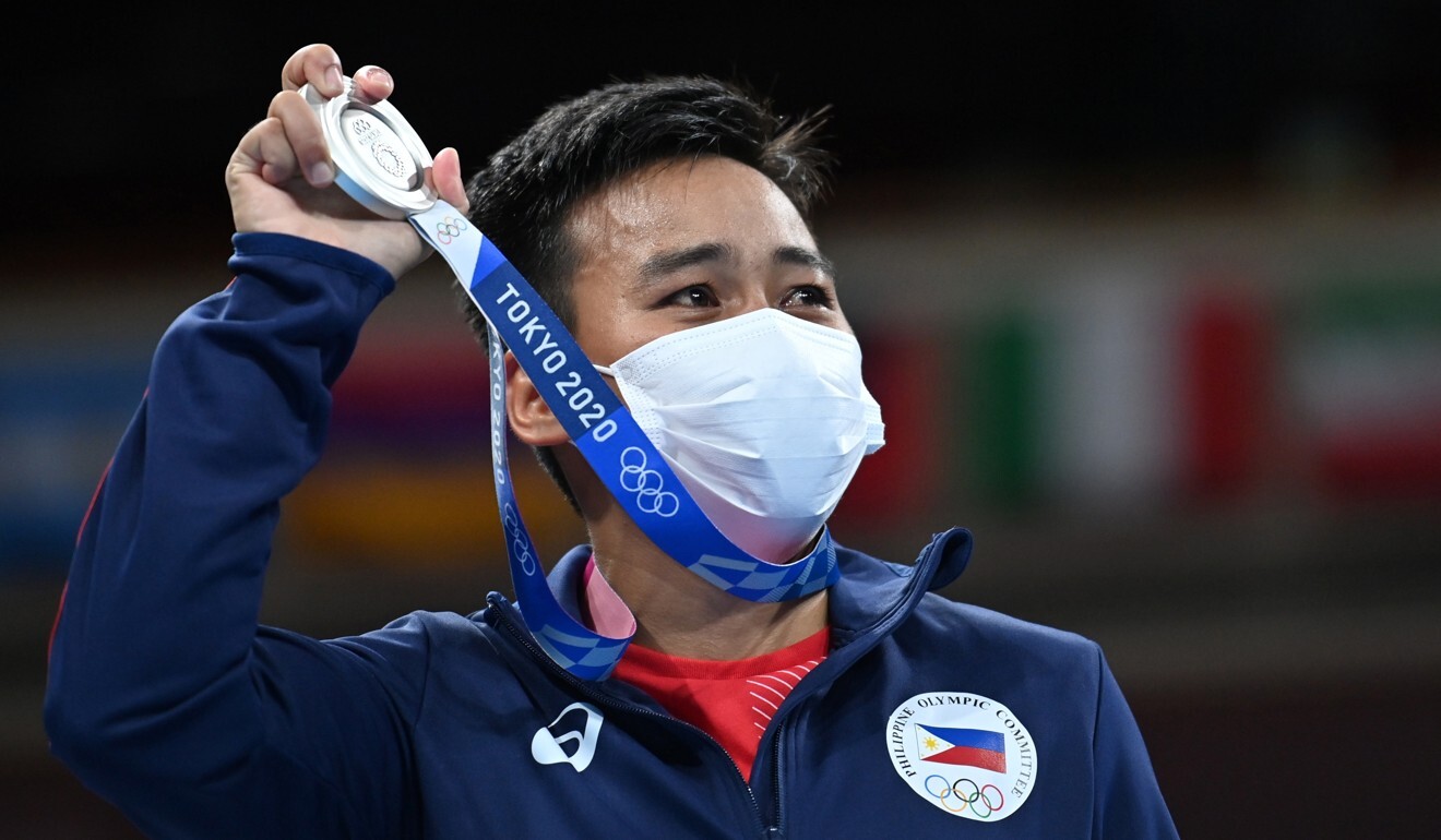 Silver medallist Nesthy Petecio of the Philippines holds her medal. Photo: Reuters