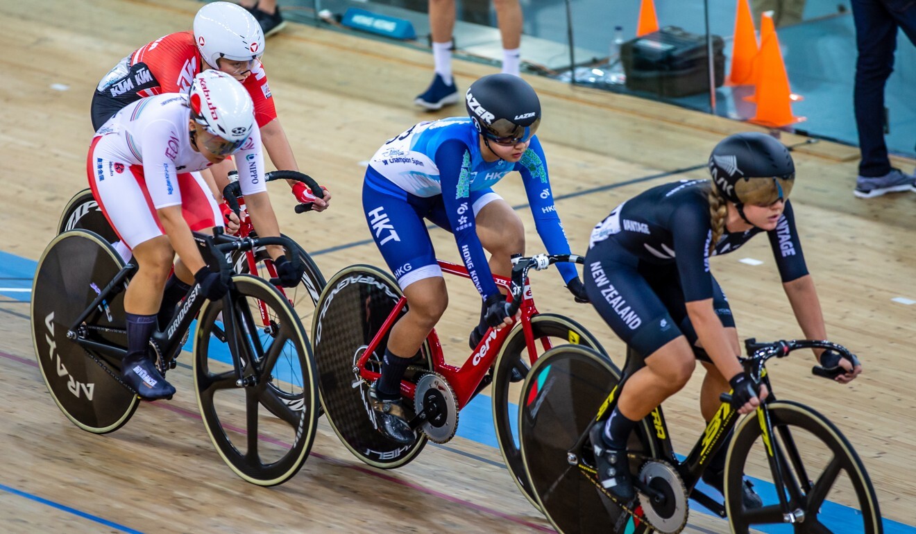 Lee Sze-wing (in blue) races in the 2019 World Cup series in Hong Kong at Tseung Kwan O velodrome. Photo: Jonathan Wong