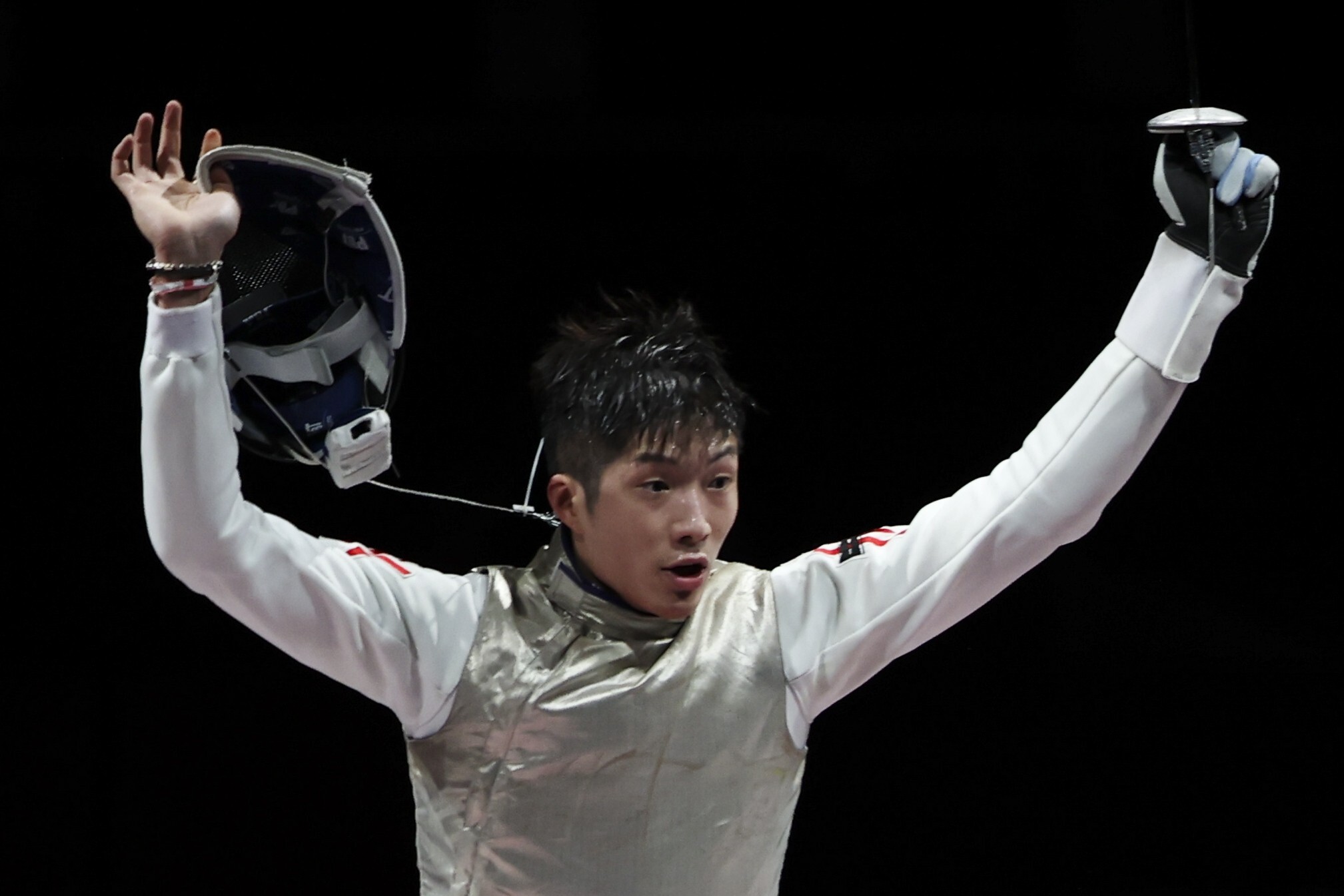 Cheung Ka-long Kong celebrates after winning Tokyo 2020 Olympics gold. Photo: Reuters