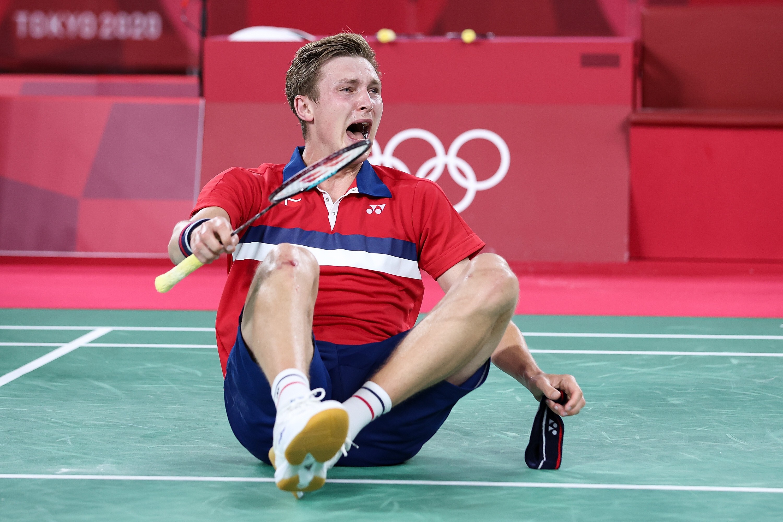 Viktor Axelsen of Team Denmark celebrates after winning the men’s singles gold medal at the Tokyo 2020 Olympic Games. Photo: Getty Images