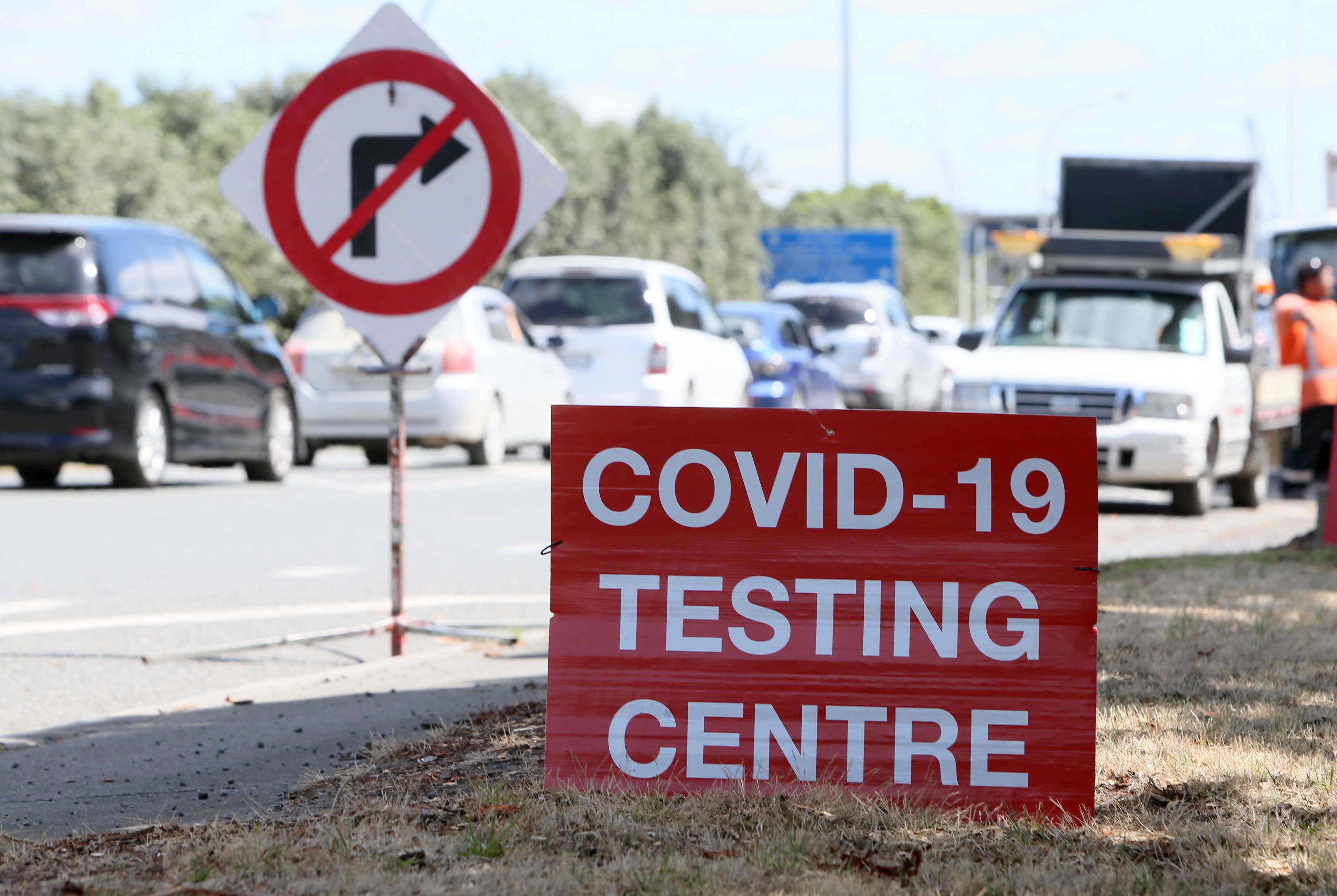 Signs direct drivers waiting for a Covid-19 test at a pop-up centre at Marsden Point, New Zealand. Photo: AP
