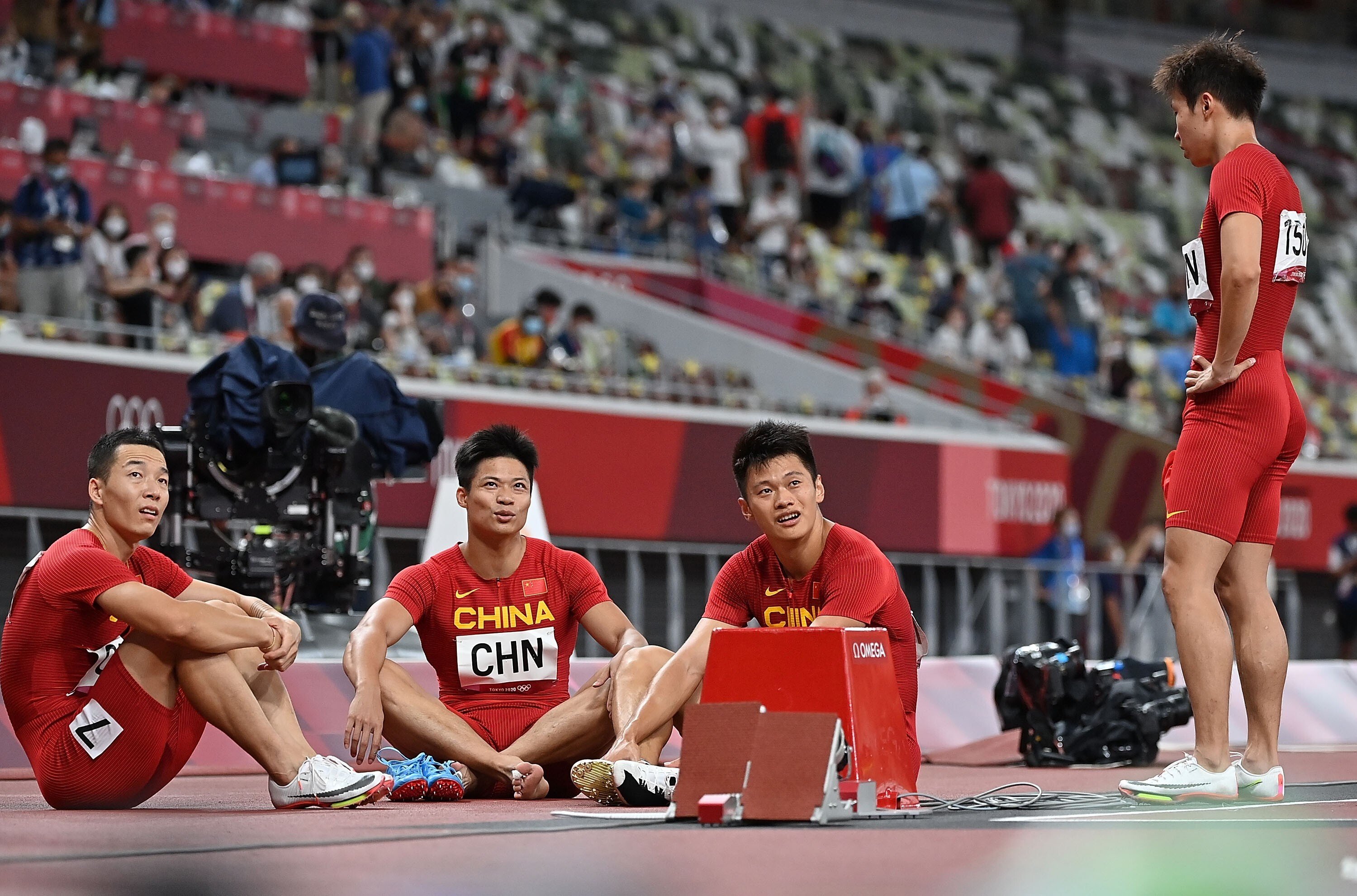 China’s 4x100m relay team react after they find out that they finished fourth in the Tokyo 2020 Olympic Games final. They could be boosted to bronze. Photo: Xinhua