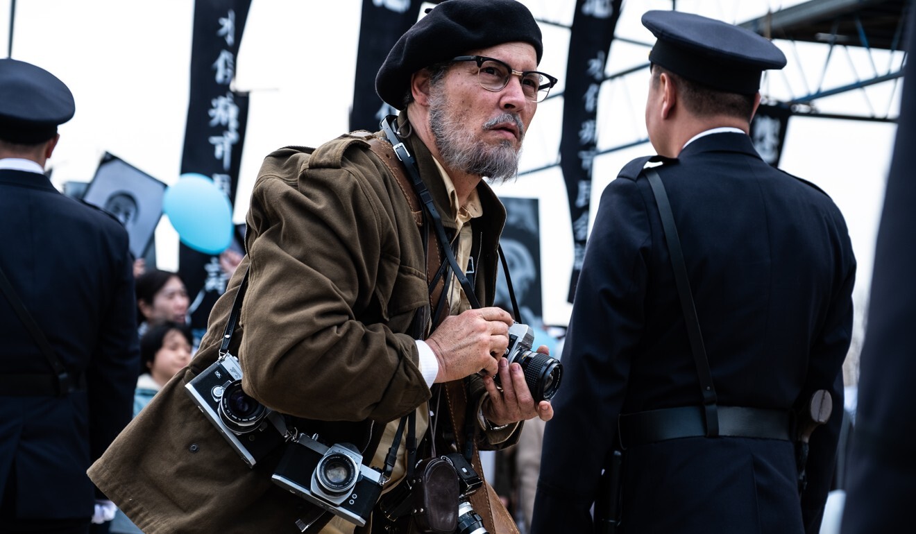 Johnny Depp stars as US photojournalist Eugene Smith. Photo: American International Pictures