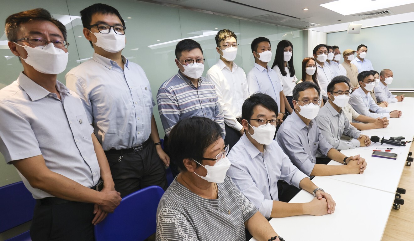 Leaders of the Professional Teachers’ Union announce its disbandment at a press conference on Tuesday. Photo: May Tse