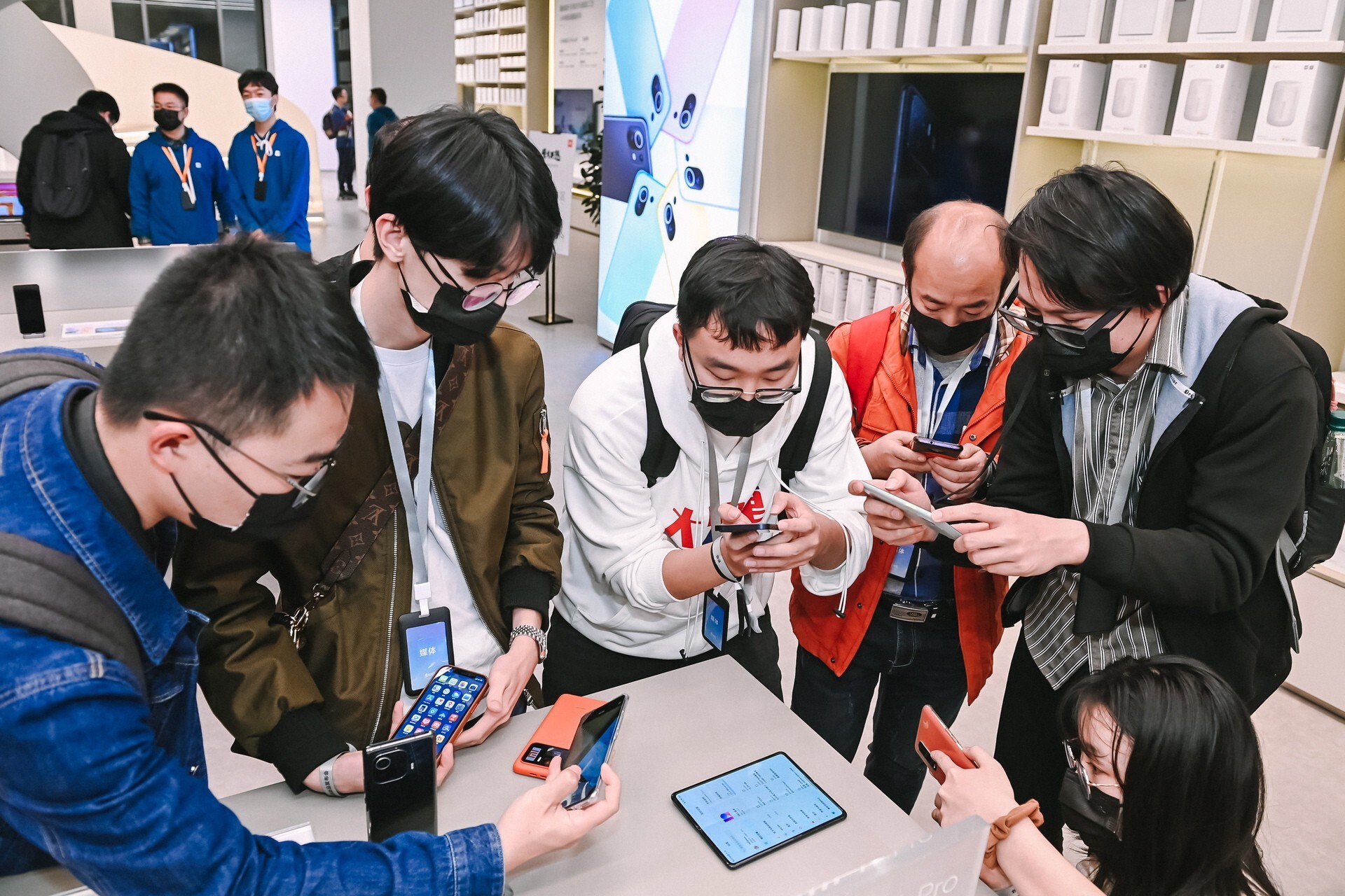 Xiaomi fans check out the company’s foldable smartphone Mi Mix Fold during a launch event in Beijing in March. Photo: Handout/EPA-EFE