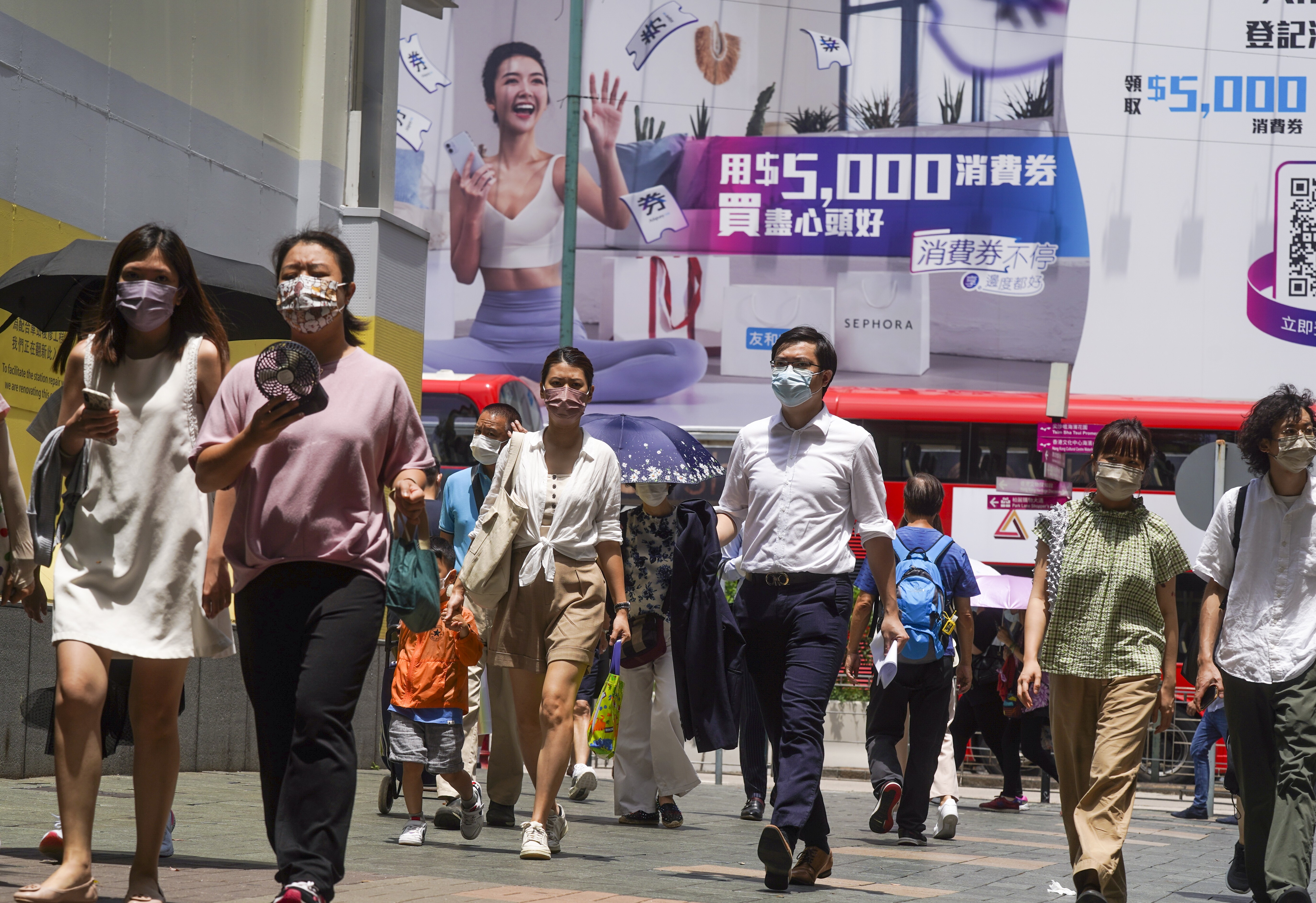 Residents go on a spending spree using their e-vouchers in the city’s various shopping belts such as Tsim Sha Tsui. Photo: Sam Tsang