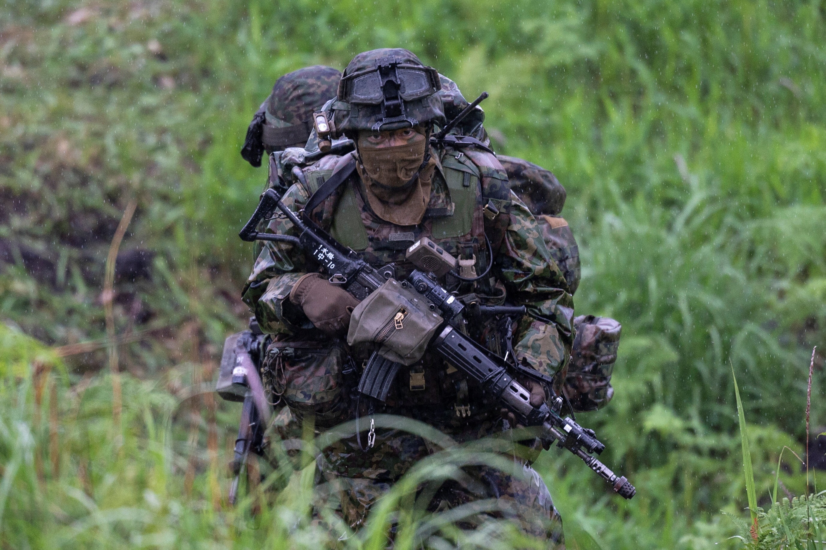 A Japanese soldier trains during a joint military drill with French and US forces. Photo: Reuters