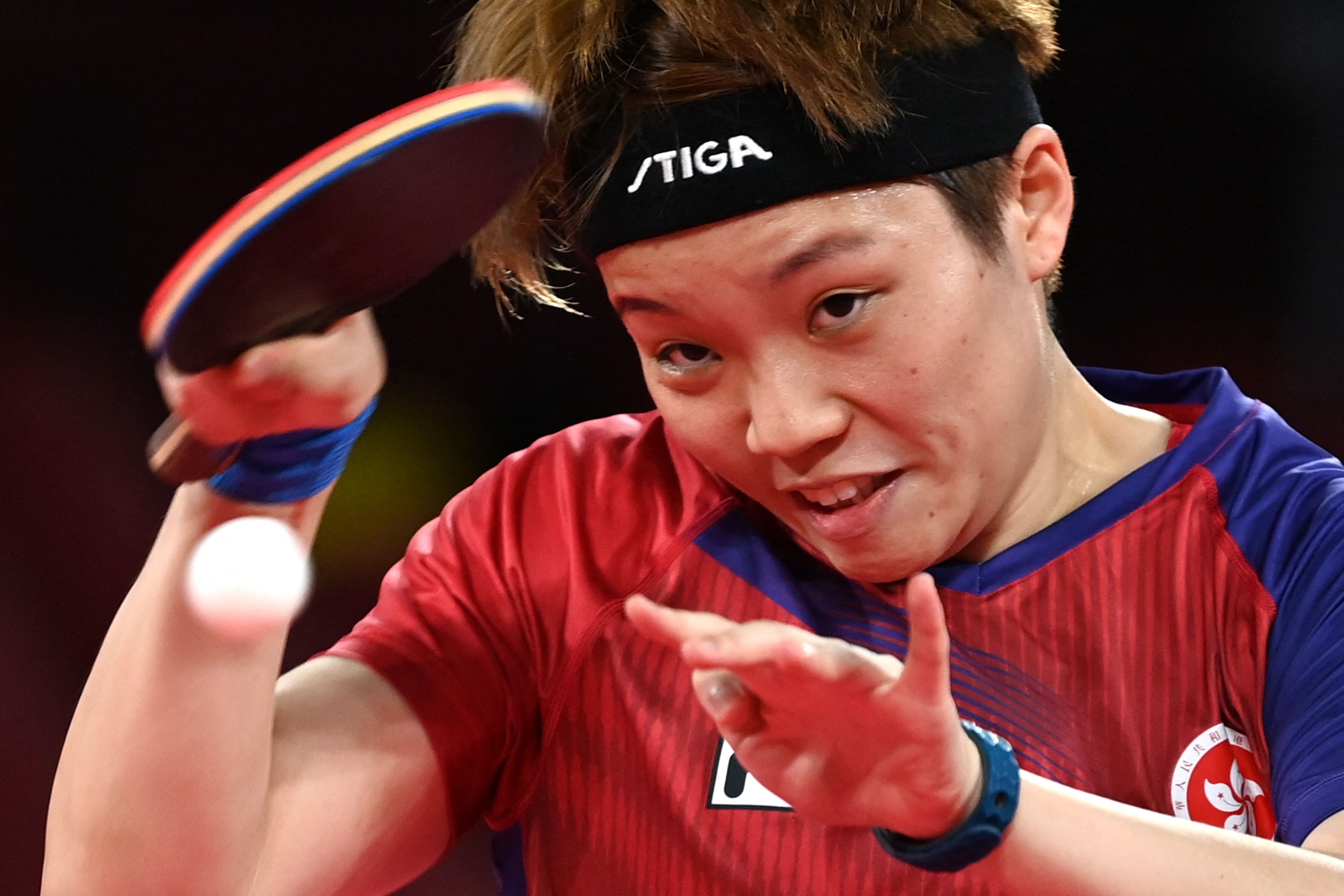 Hong Kong's Doo Hoi-kem competes against Japan's Mima Ito during their women's team semi-final table tennis match at the Tokyo Metropolitan Gymnasium during the Tokyo 2020 Olympic Games. Photo: AFP