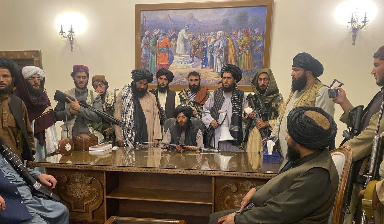 Taliban fighters take control of Afghanistan’s presidential palace. Photo: AP