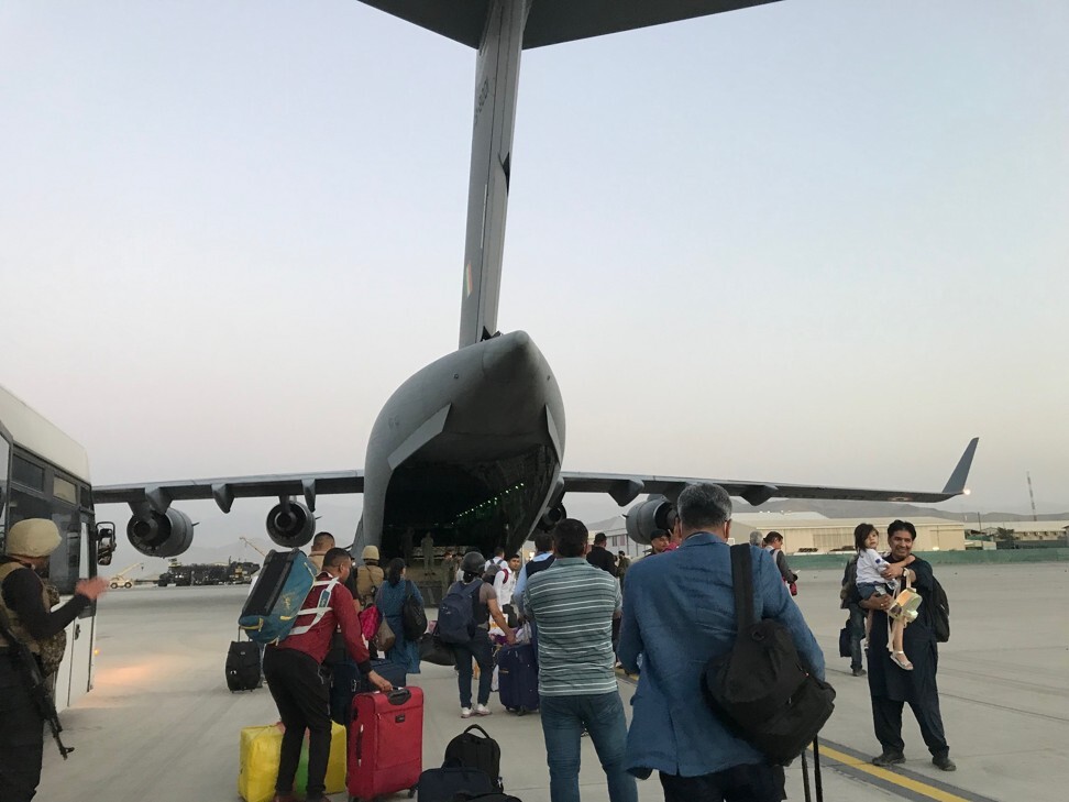 A military aircraft evacuates over 120 Indian citizens from Kabul. Photo: Sonia Sarkar