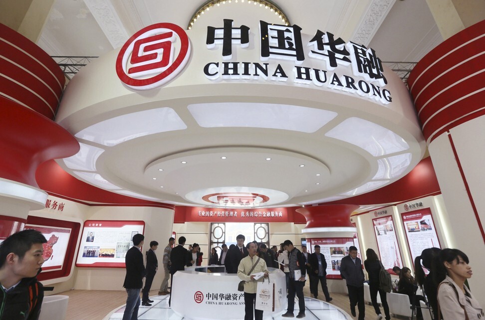 China Huarong Asset Management’s logo during a finance expo in Beijing on October 30, 2014. Photo: Reuters