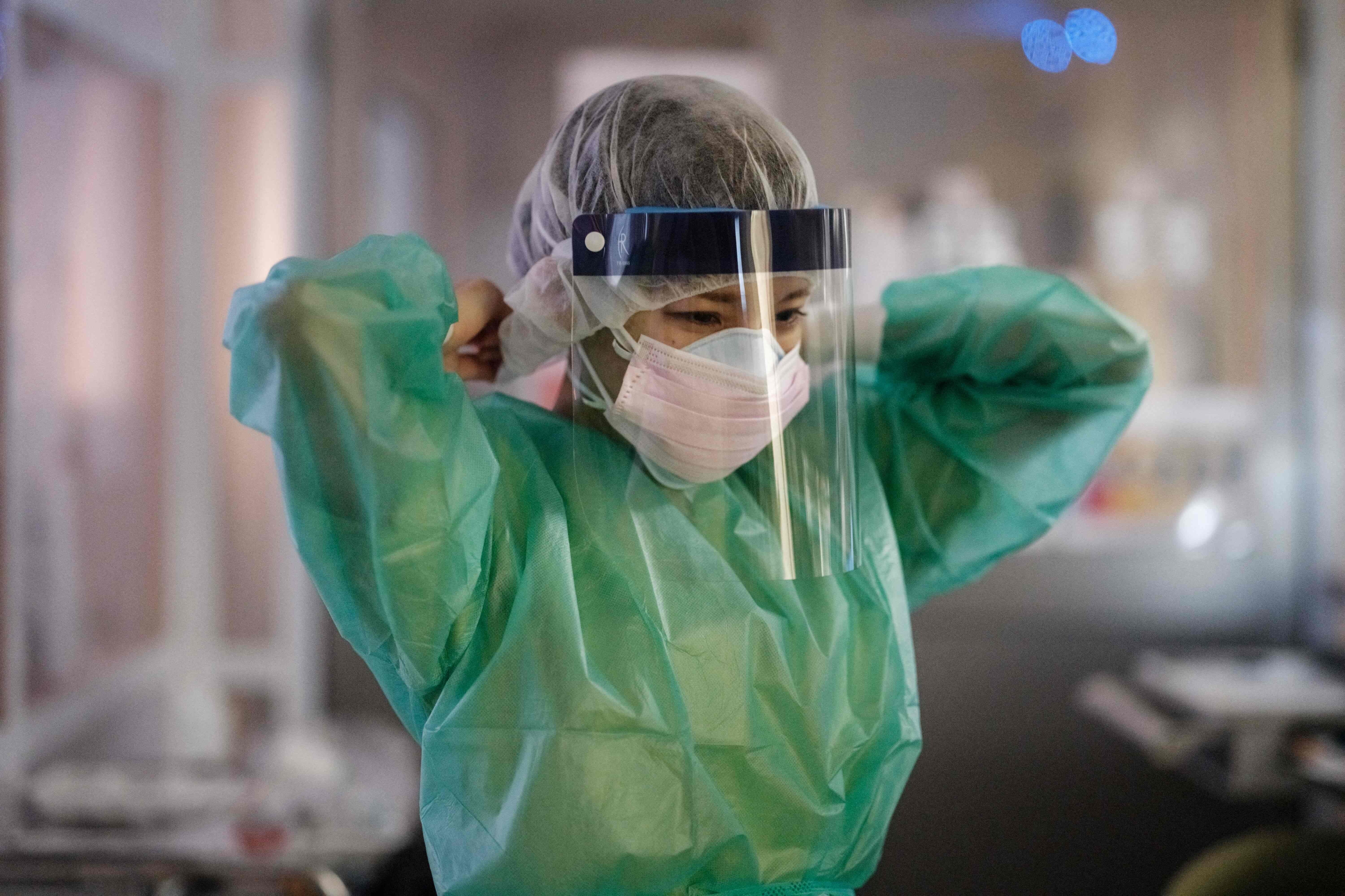 The number of new infections has shown little signing of slowing in Tokyo and nationwide, placing an increased strain on health care systems. Photo: AFP