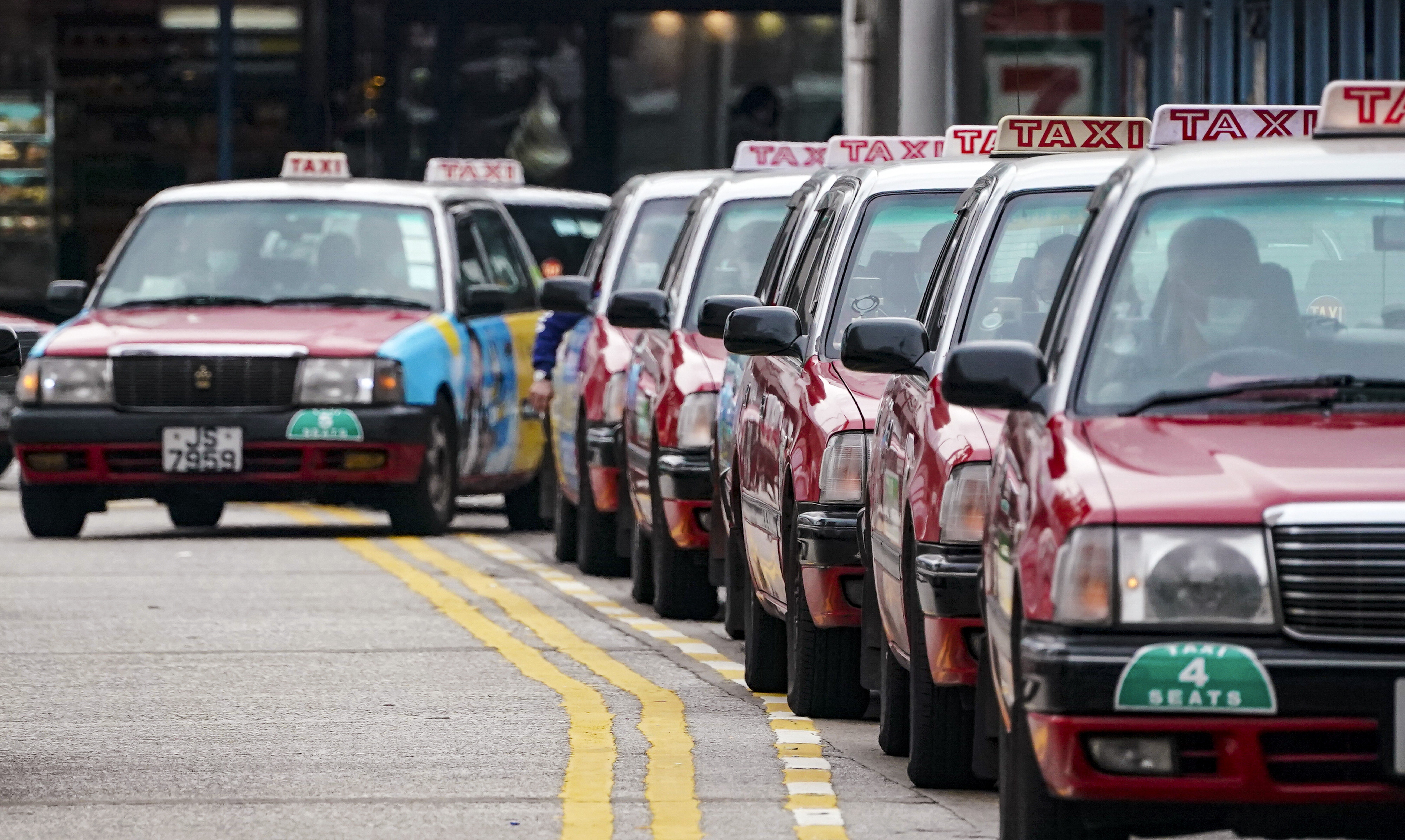 Hong Kong’s most popular cab-hailing app, HKTaxi, is now owned by Uber. Photo: Felix Wong