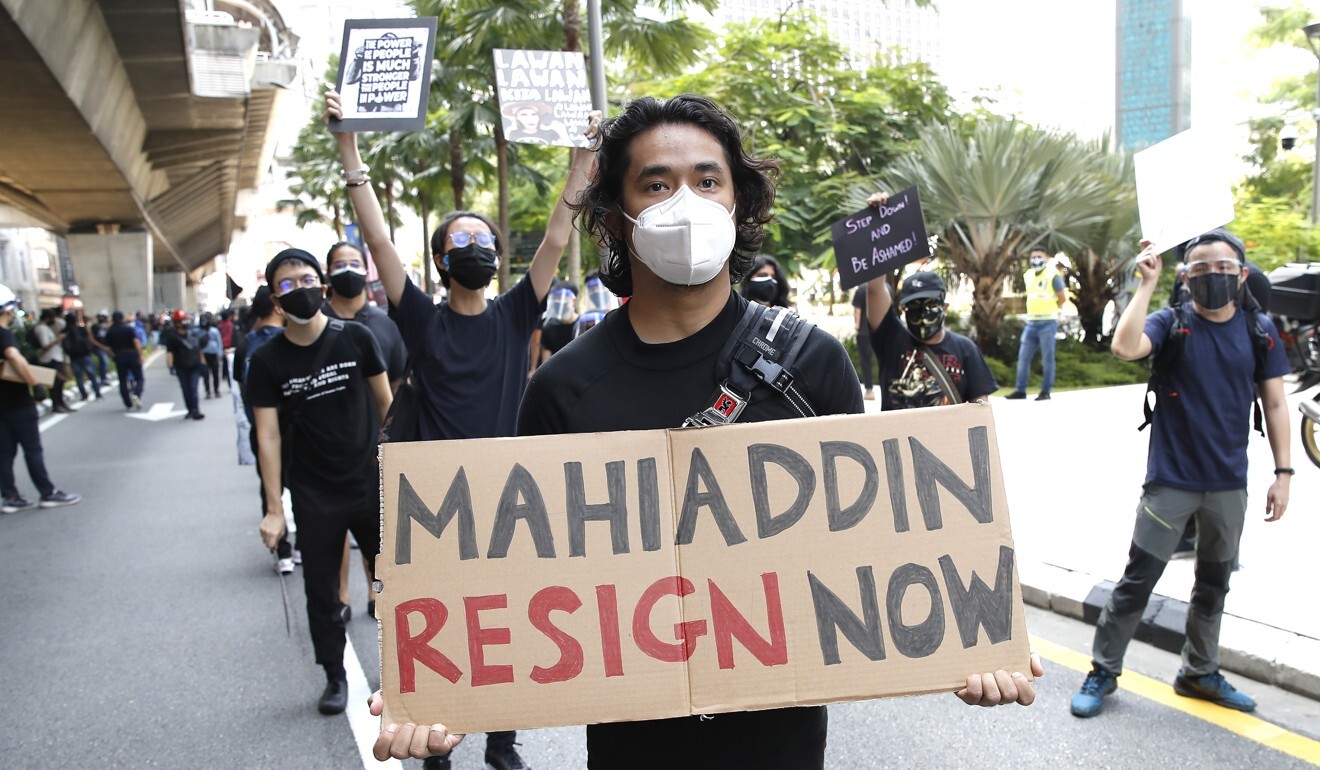 A protester demanding the resignation of Malaysian Prime Minister Muhyiddin Yassin. Photo: AP