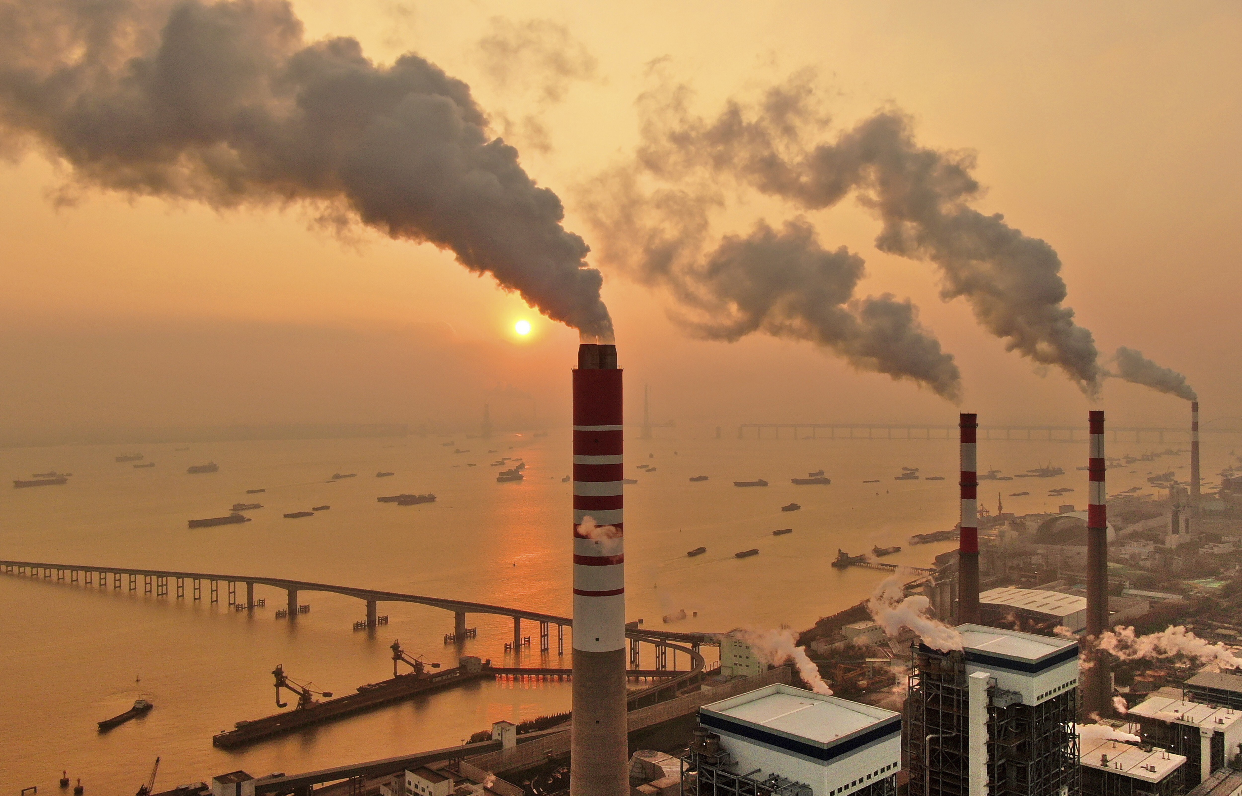 China remains in a twilight between aiming for carbon neutrality in 2060 but not yet giving up coal power. It is competing with the US for supremacy in the renewables technology race. Photo: AP