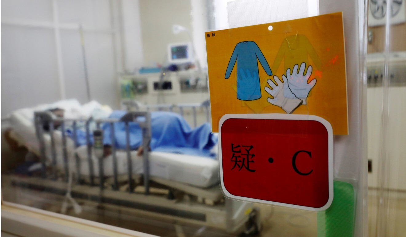 A patient suspected of having Covid-19 inside the ICU of Seibu Hospital in Yokohama, Japan. Photo: Reuters