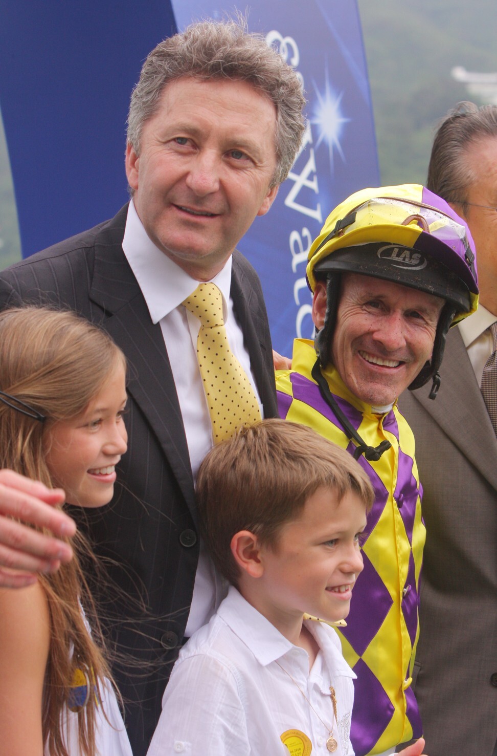A young Luke Ferraris (centre) with his father David (top) after a winner in 2010. Photo: Kenneth Chan