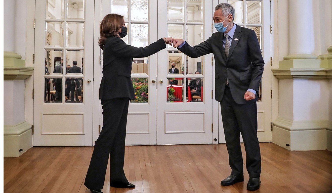 Harris and Lee during their meeting in Singapore. Photo: AFP