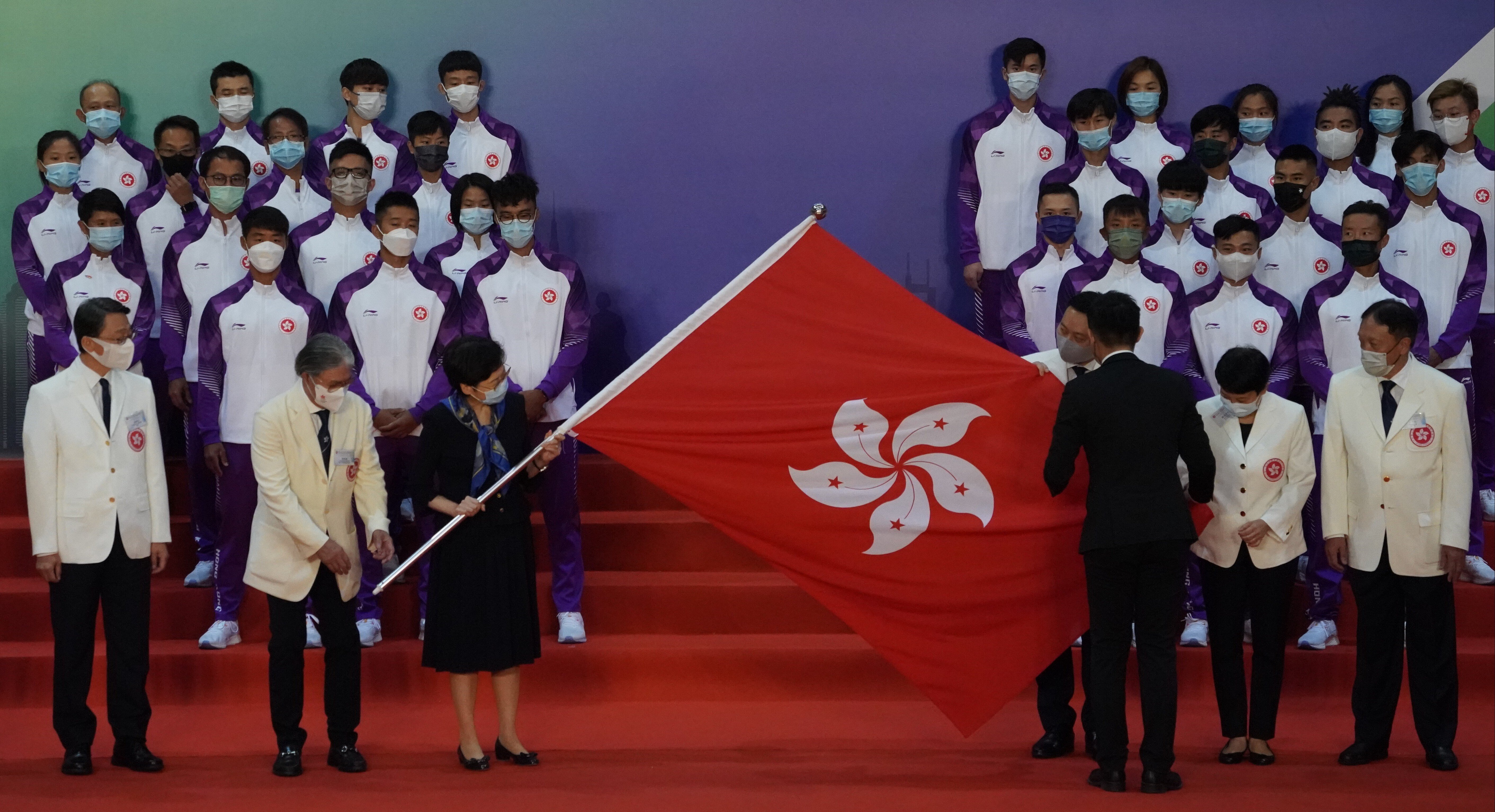 Chief Executive Carrie Lam Cheng Yuet-ngor officiates at the flag presentation ceremony for HKSAR delegation to the 14th National Games. Photo: Felix Wong