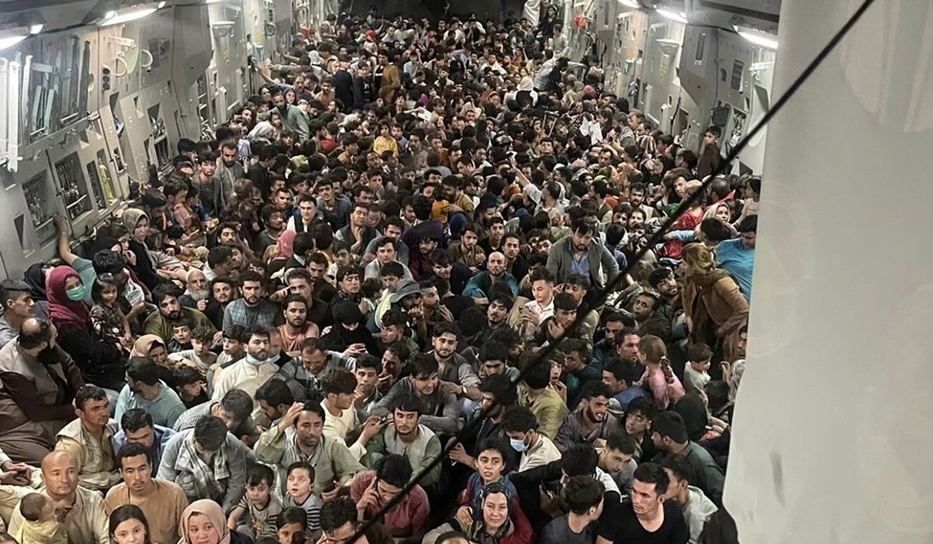 More than 600 Afghans crammed into a US Air Force plane flying from Kabul to Qatar on August 15. Photo: AFP
