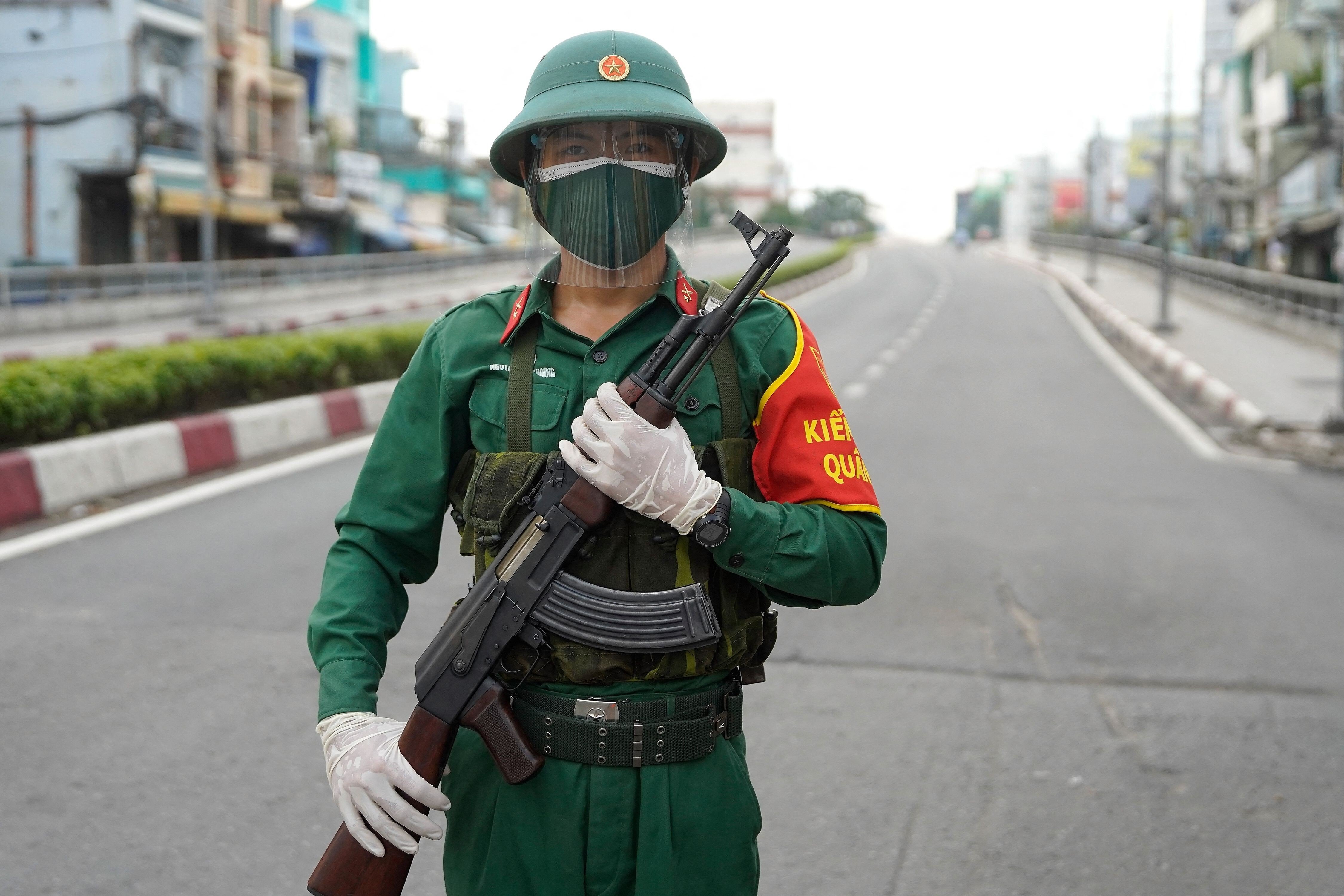 Vietnamese troops have been deployed to Ho Chi Minh City to oversee the enforcement of stay-at-home orders and 2,000 soldiers will be sent to Binh Duong. Photo: AFP