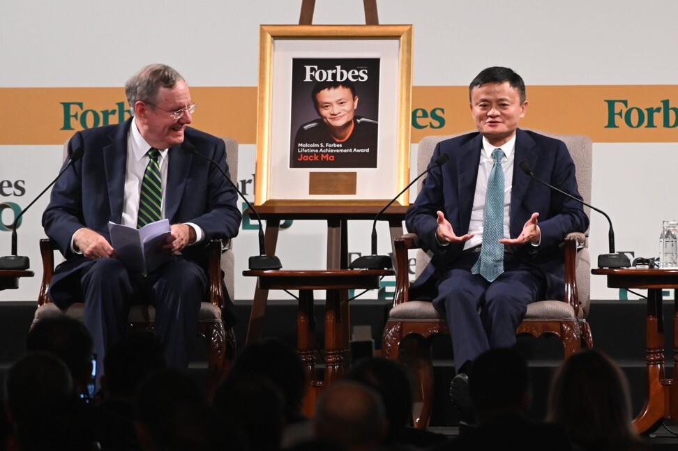 Forbes editor-in-chief Steve Forbes speaks with Jack Ma (right), co-founder of Alibaba Group Holding, at a conference in Singapore, in 2019. Photo: AFP