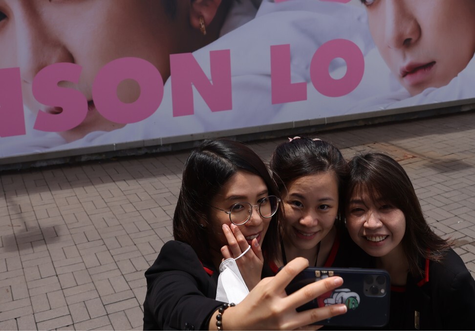 Fans of boy band Mirror gather in front of a billboard celebrating member Anson Lo Hon-ting’s birthday in 2021. Photo: Nora Tam