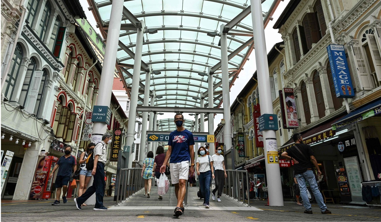 A man leaves a subway station in the Chinatown district of Singapore. Photo: AFP