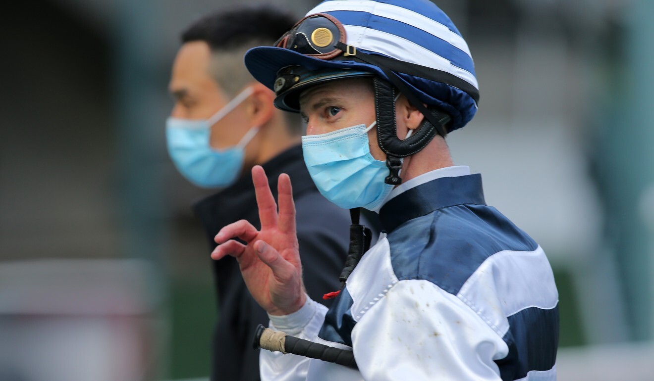 Zac Purton acknowledges his fans after a victory.