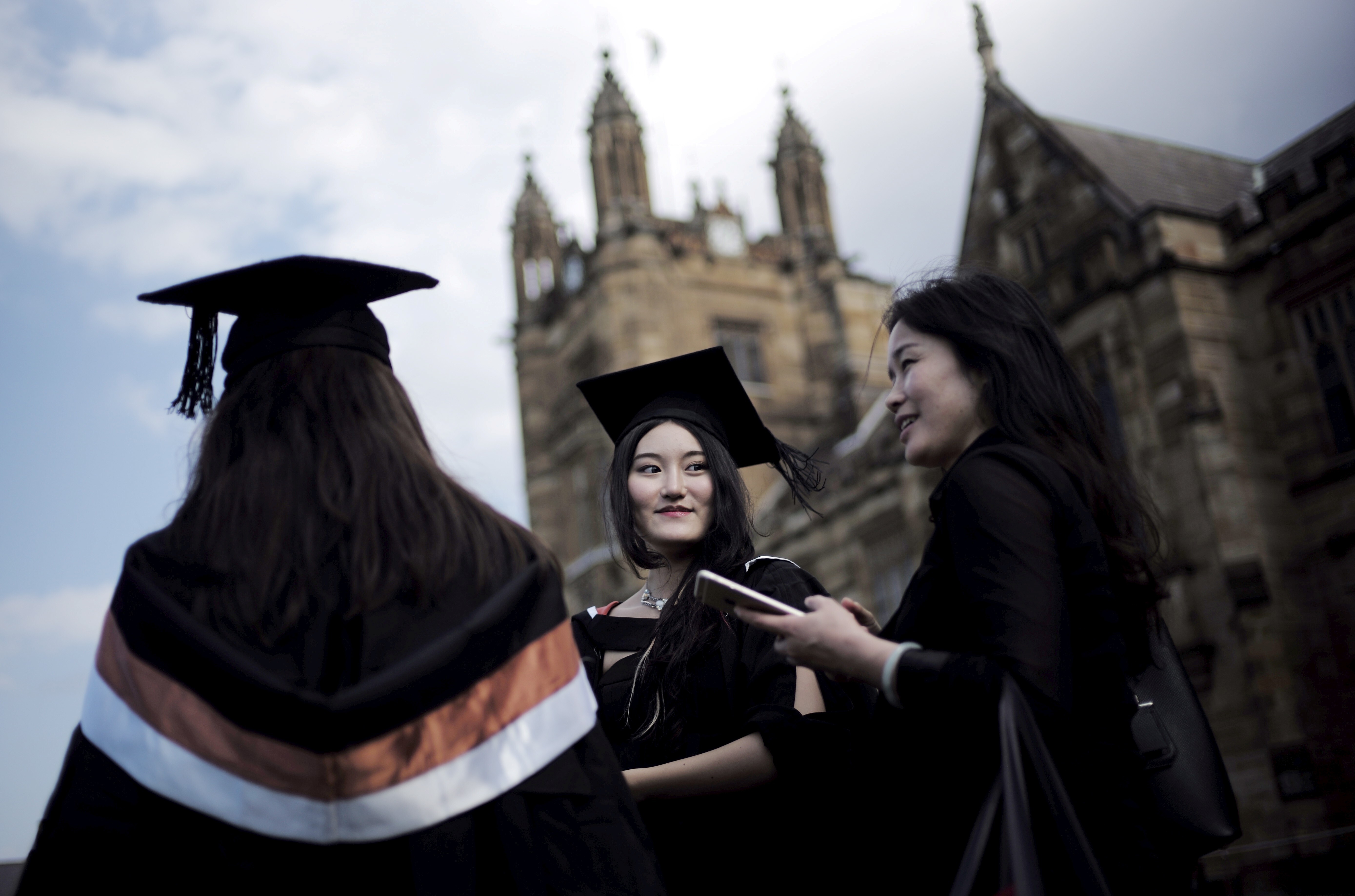 Students graduate from the University of Sydney in Australia. Photo: Reuters