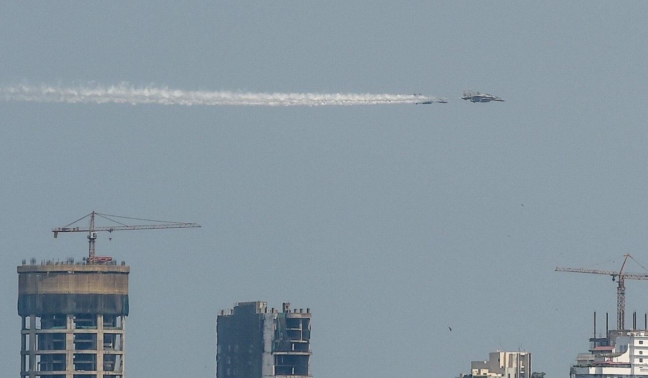 Indian Air Force Sukhoi Su-30 fighter jets fly over Mumbai to pay tribute to ‘frontline warriors’ fighting against Covid-19, in May 2020. Photo: AFP
