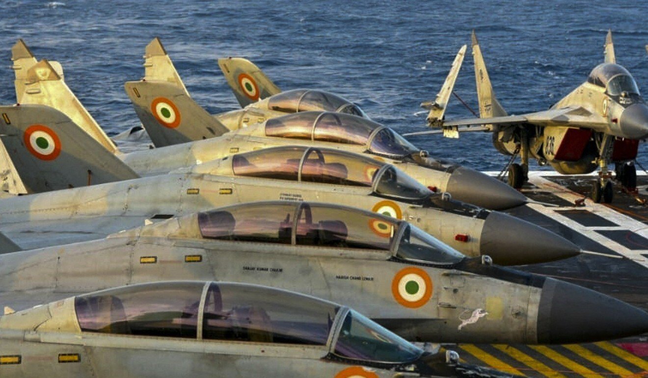 Indian fighter jets are seen on the back of an aircraft carrier during the Malabar naval exercises between India, Australia, Japan and the United States in November. Photo: AFP