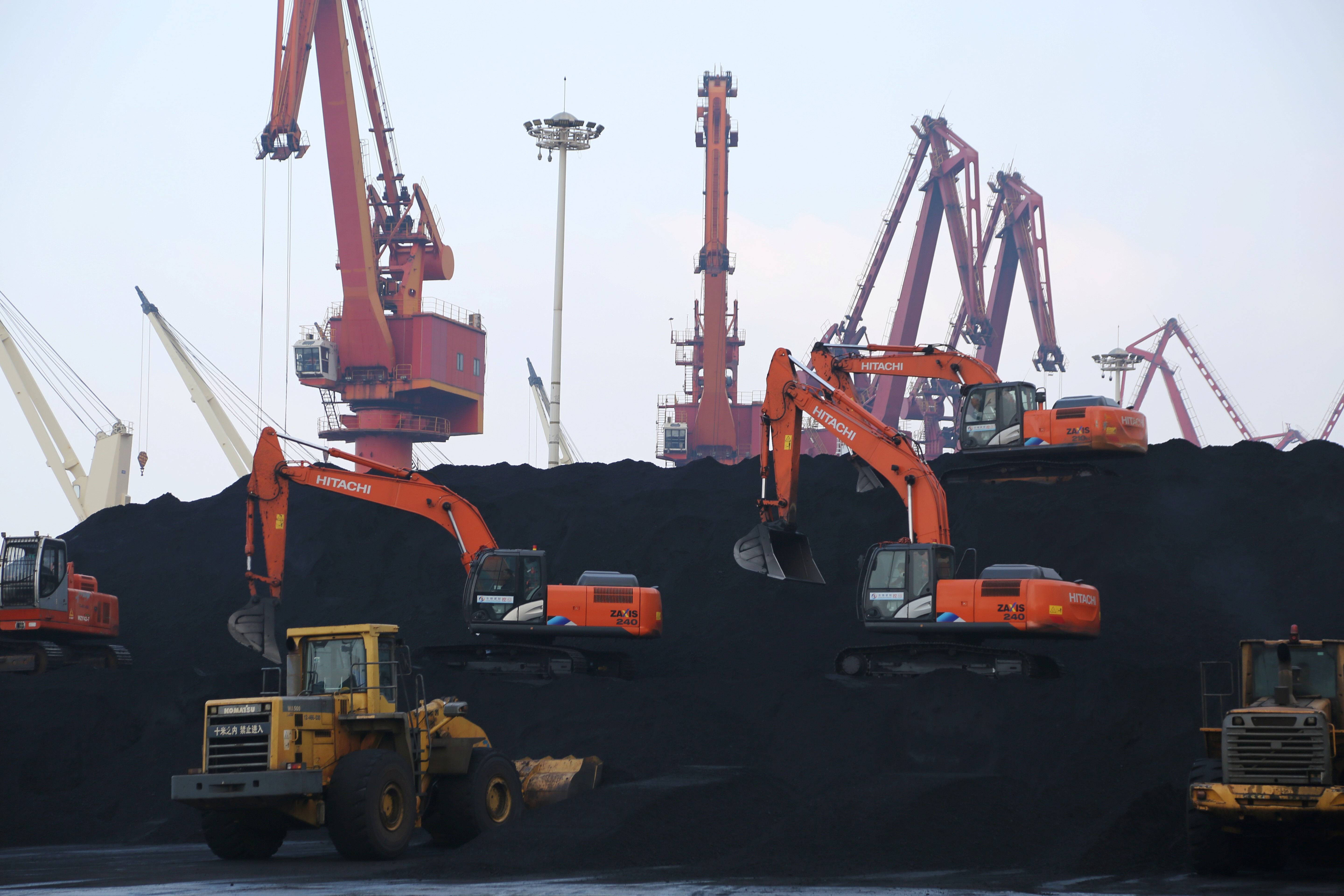 Imported coal is unloaded at a port in China’s Jiangsu province. Photo: Reuters