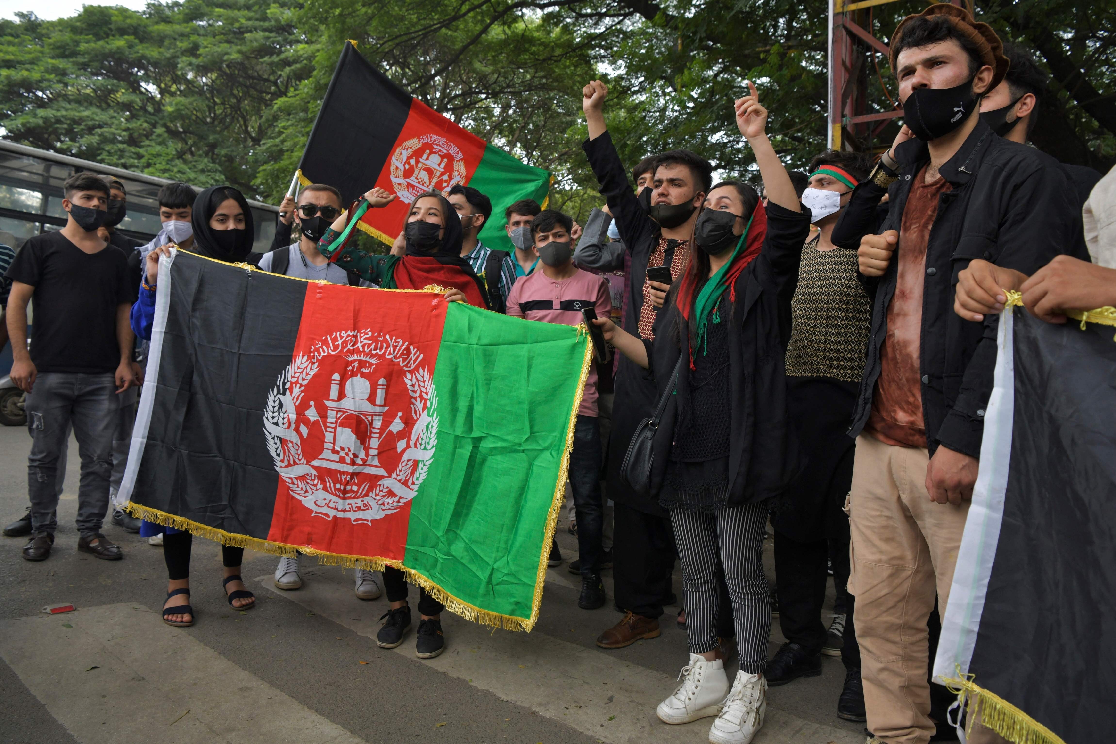 Afghan students in Bangalore, India, shout slogans during a protest against the Taliban and Pakistan on September 8. Photo: AFP