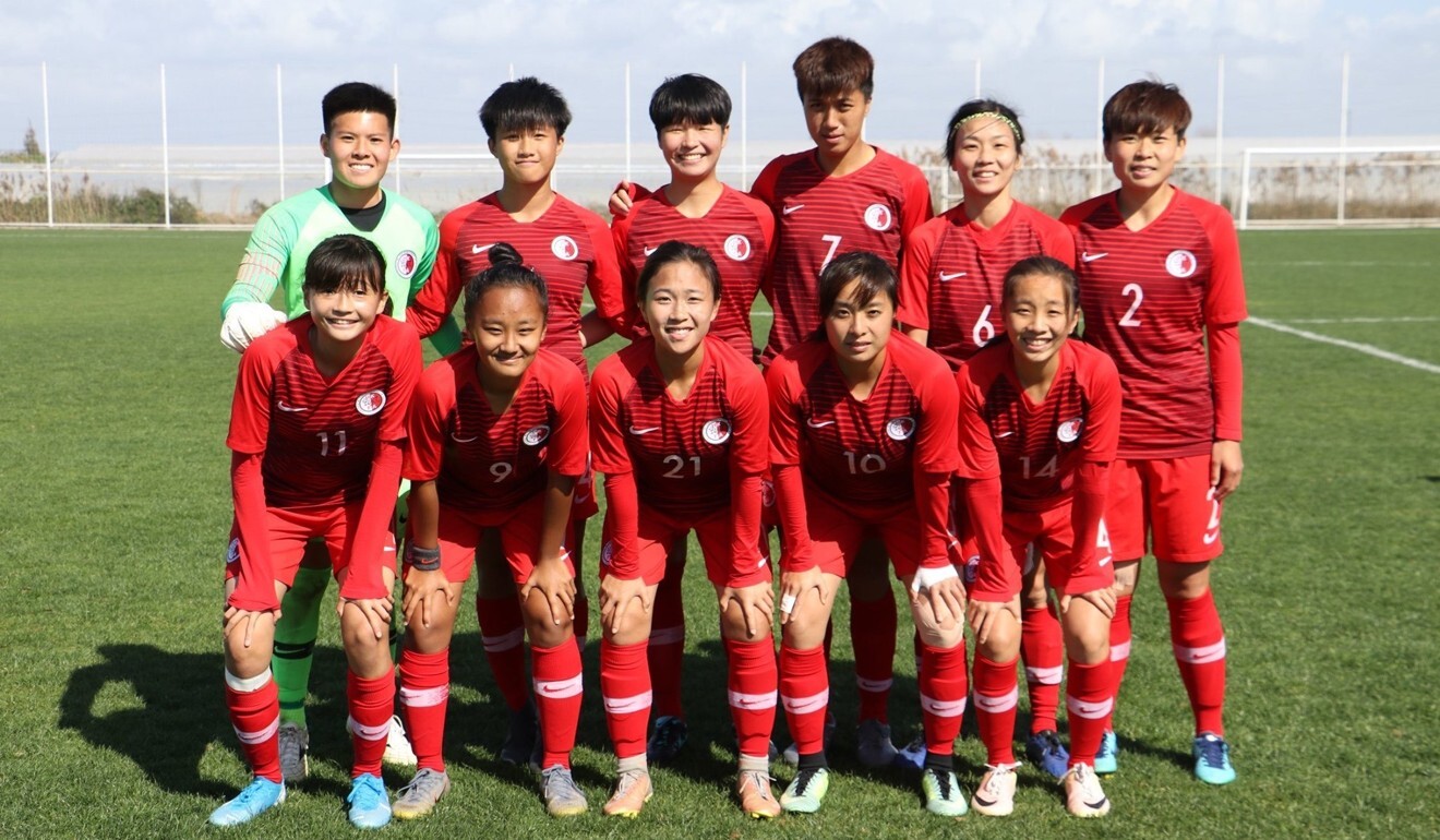 Hong Kong women’s under-18s footballer Karri Chan (front, left) with teammates ahead of a game against Guam in 2020. Photo: Handout
