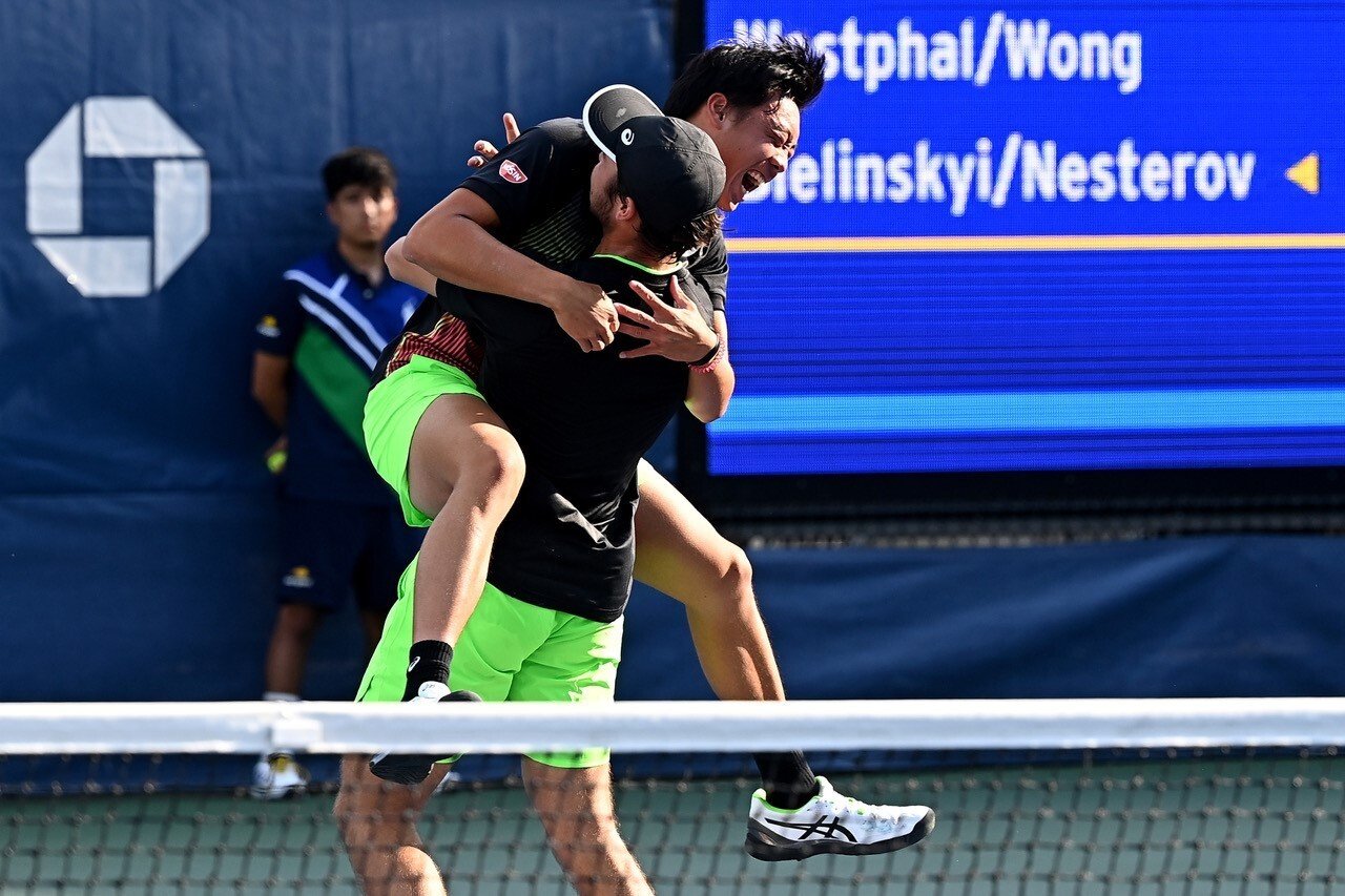 Coleman Wong and partner Max Westphal celebrate winning the boys’ doubles title at the US Open in New York. Photo: arckphoto/arckimages.com