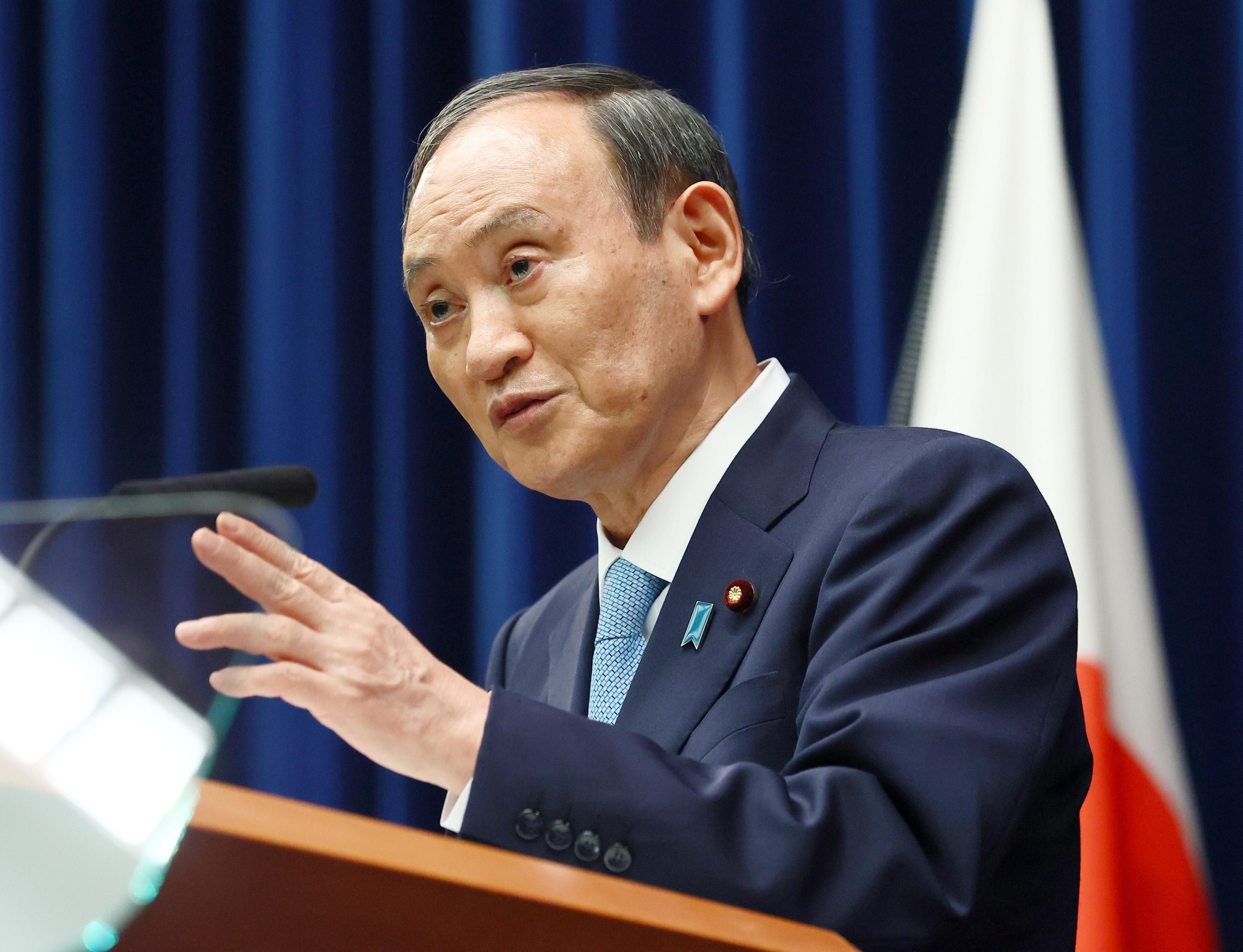 Japanese Prime Minister Yoshihide Suga attends a press conference at his office in Tokyo. Photo: Kyodo