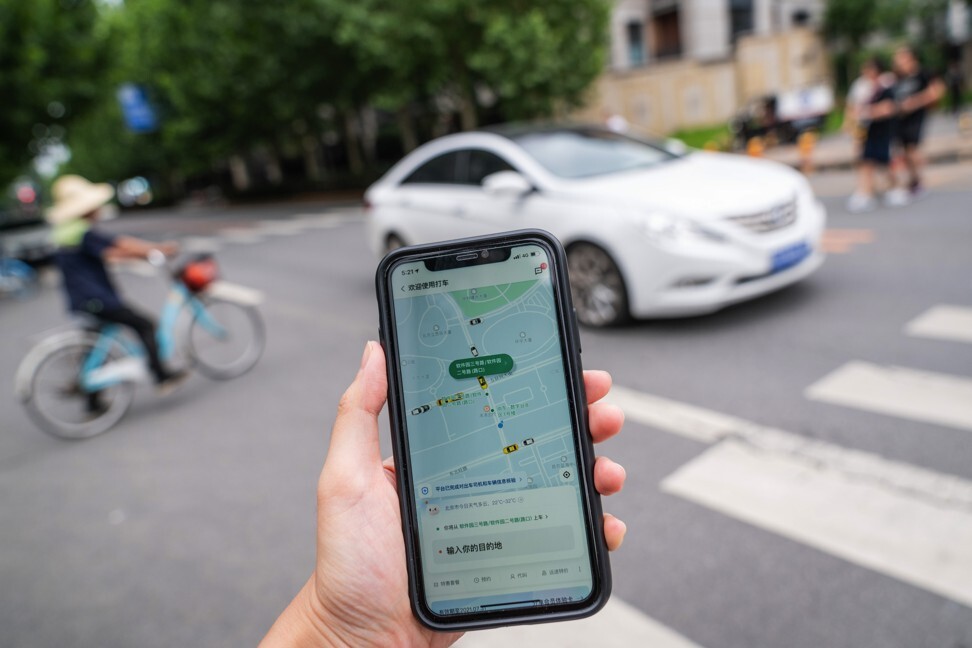 Didi’s ride-hailing app on a smartphone arranged in Beijing on Monday, July 5, 2021. Photo: Bloomberg