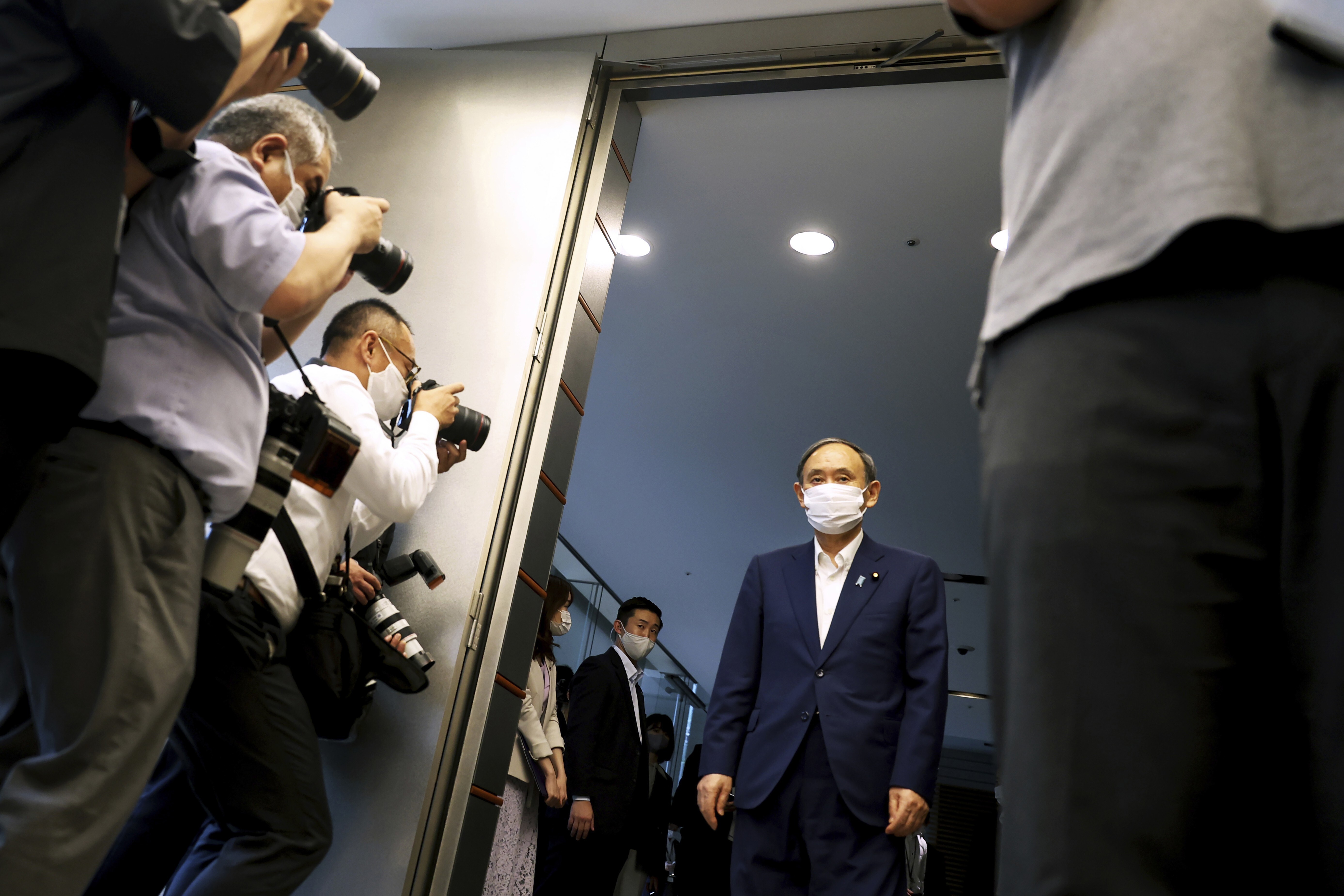 Japanese Prime Minister Yoshihide Suga’s support plunged over his handling of the Covid-19 pandemic and decision to proceed with the Tokyo Olympic Games. Photo: AP