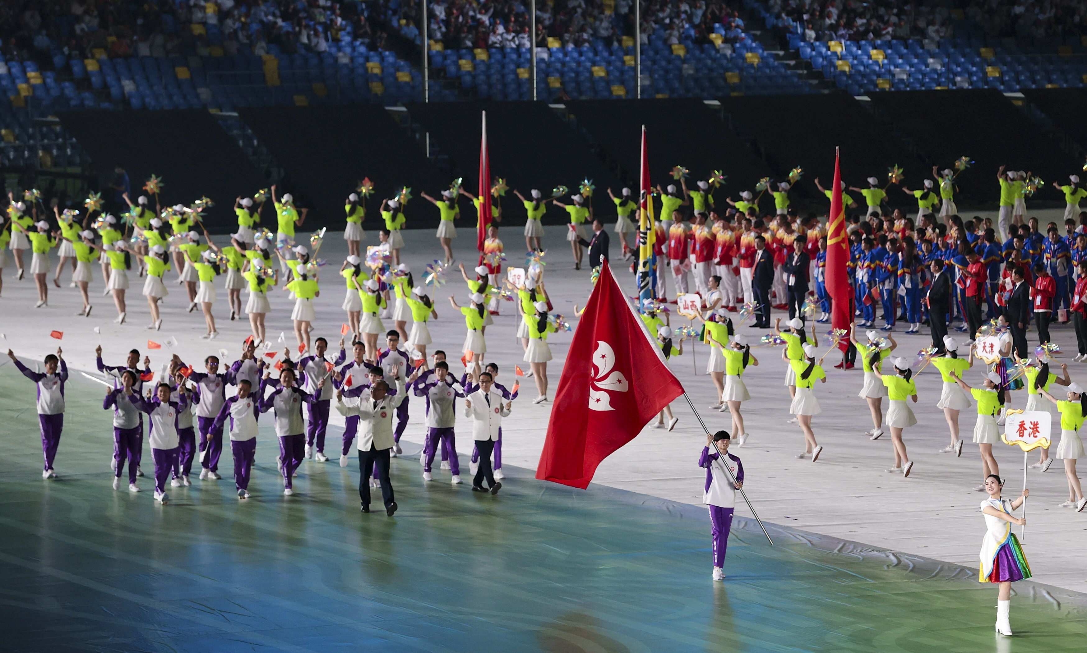 Hong Kong’s team arrives as the National Games opens in Xian. Photo: Xinhua