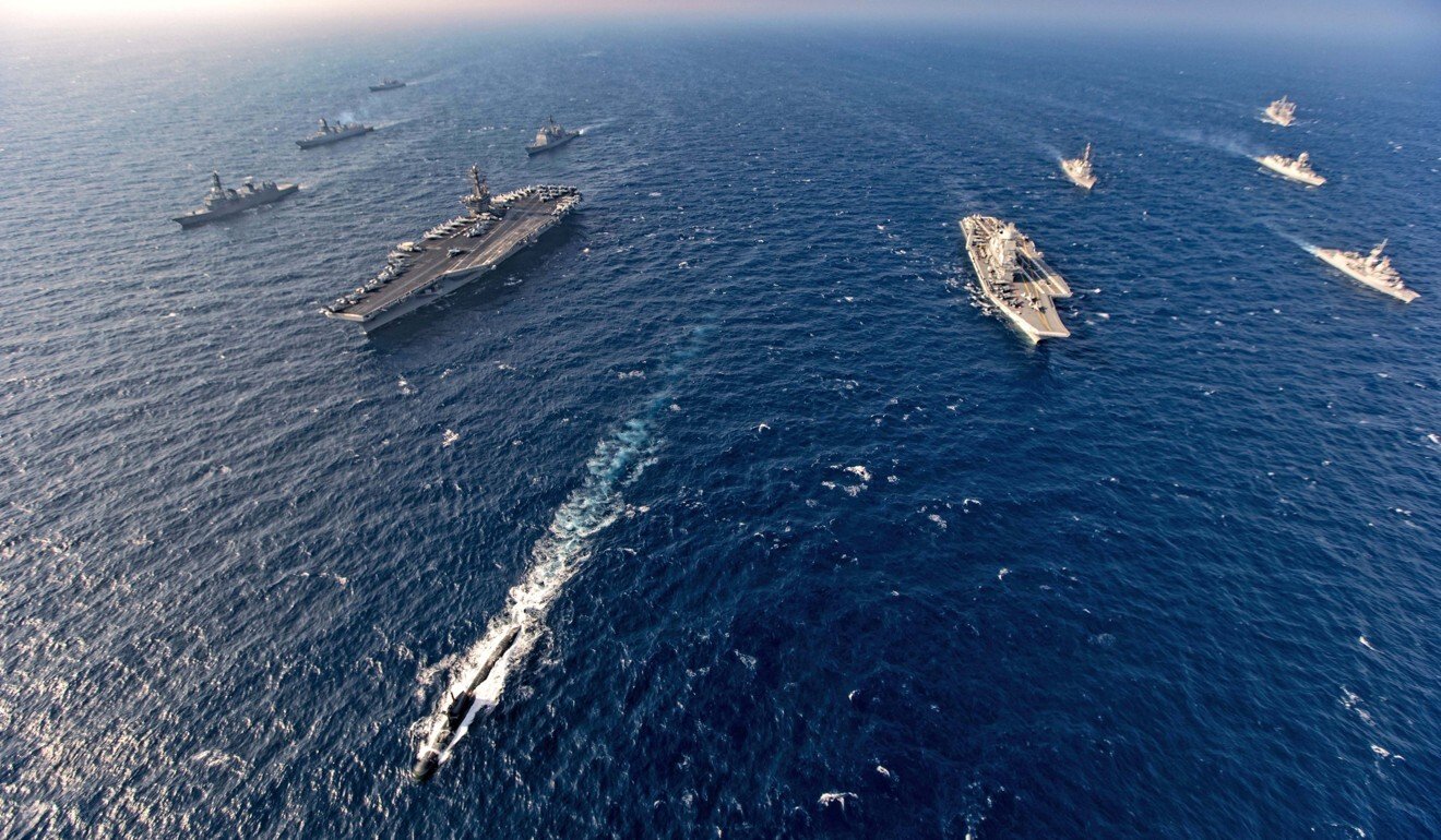 Aircraft carriers and warships participate in a joint exercise of the Quad – India, US, Japan and Australia – in November 2020. Photo: Indian Navy via AP