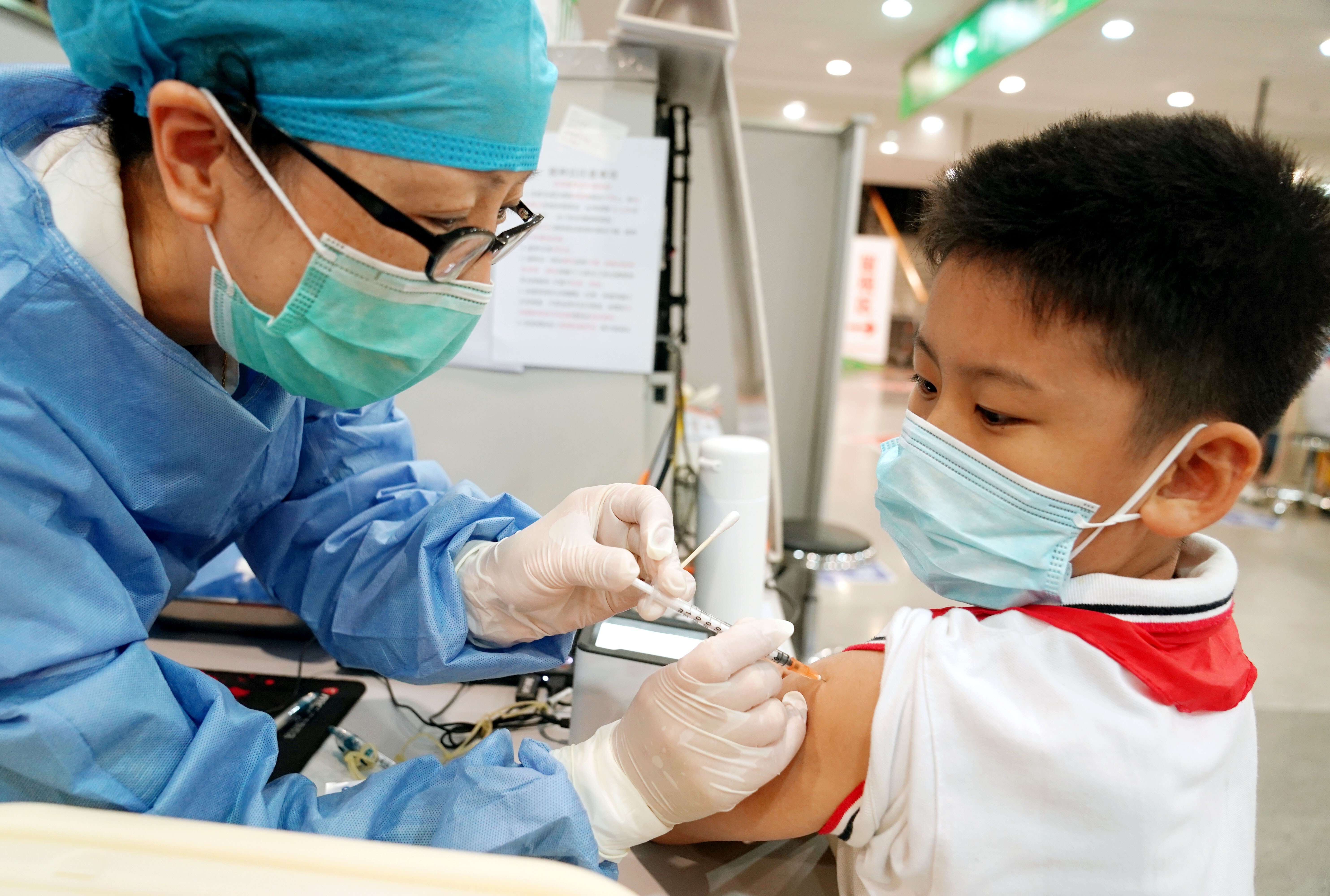 China is now vaccinating children aged 12 and older. Photo: Xinhua
