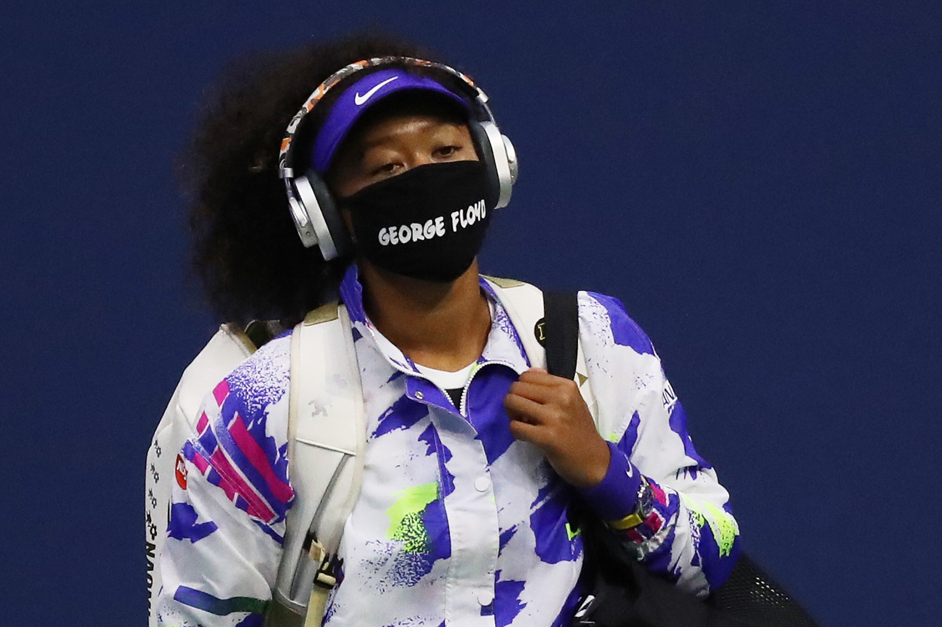 Naomi Osaka of Japan walks onto court at the 2020 US Open wearing a mask with the name of George Floyd on it. Photo: TNS