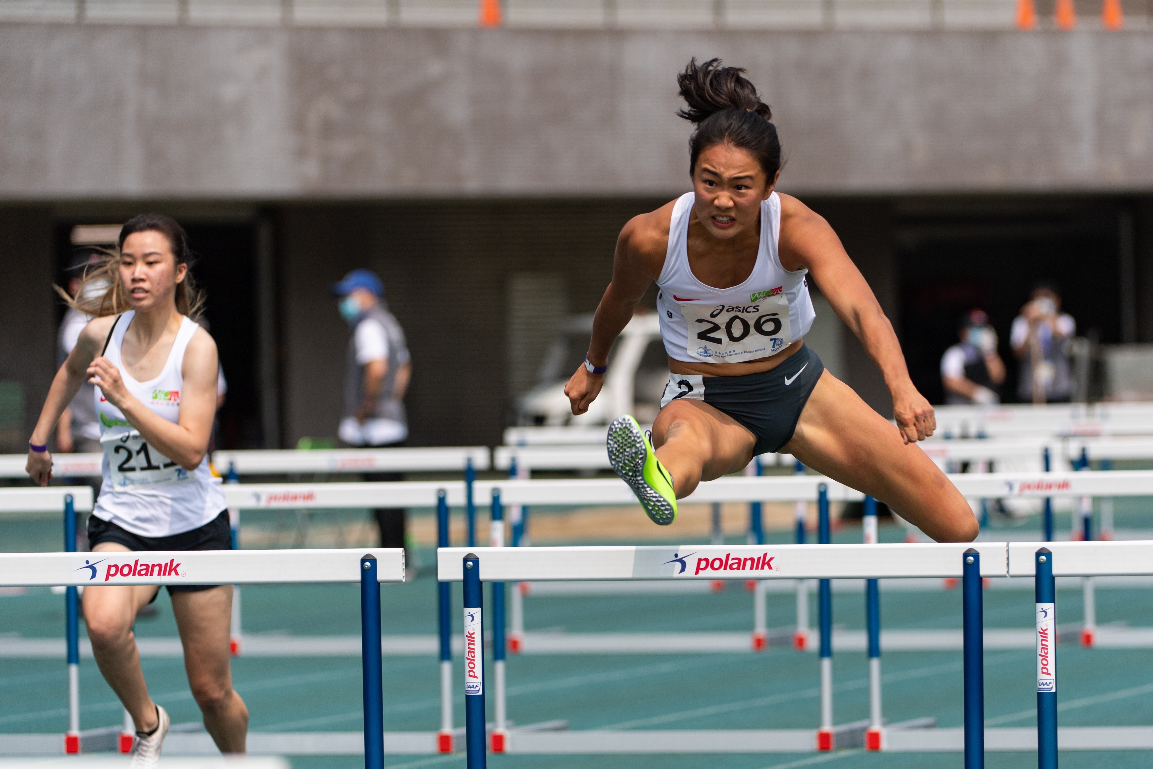 Vera Lui clears the hurdles on her way of winning the 100m women’s hurdles at the 2021 Athletics Series 1 at Tseung Kwan O Sports Ground in March. Photo: HKAAA